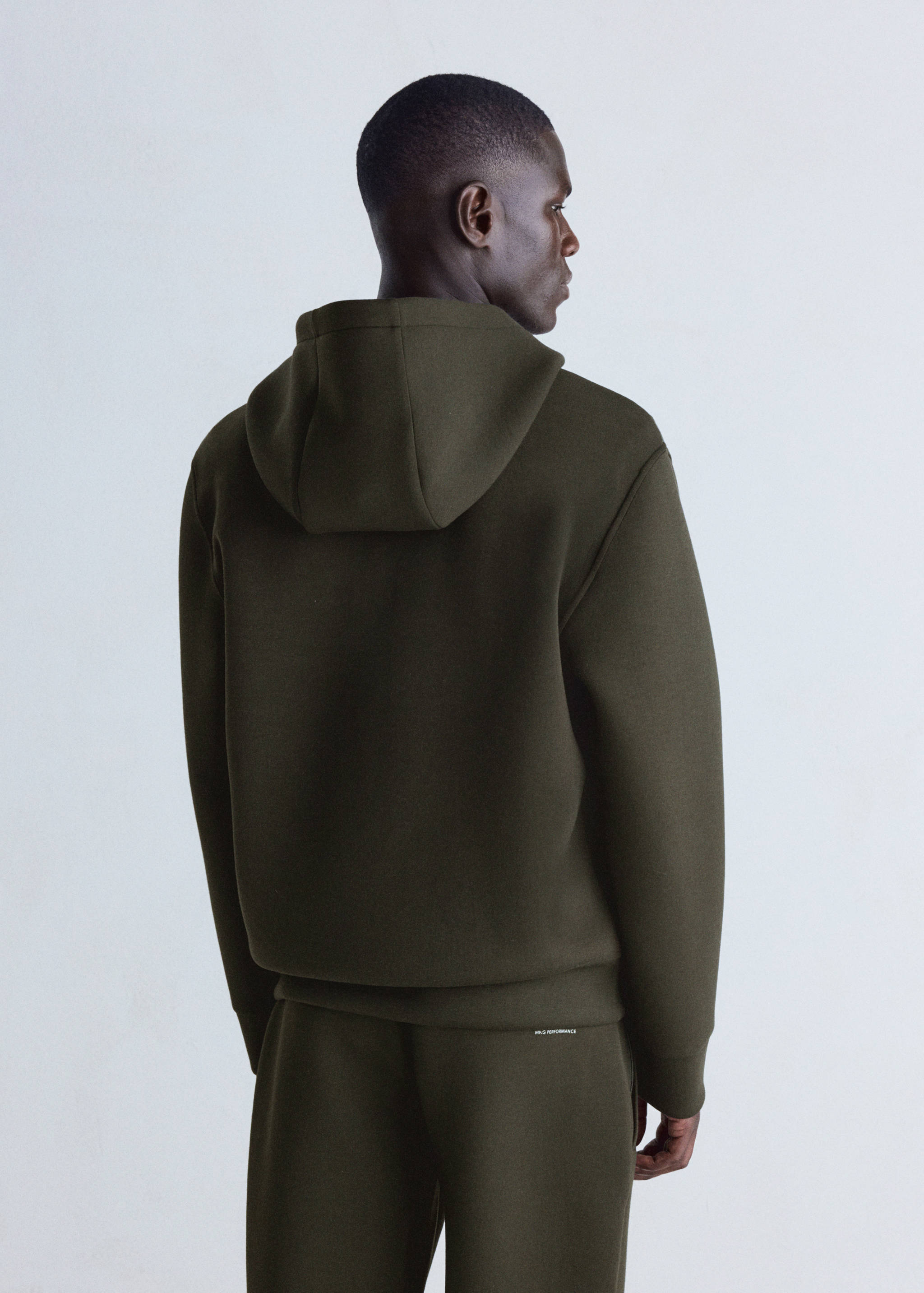 Dark olive green hooded sweatshirt, back view.