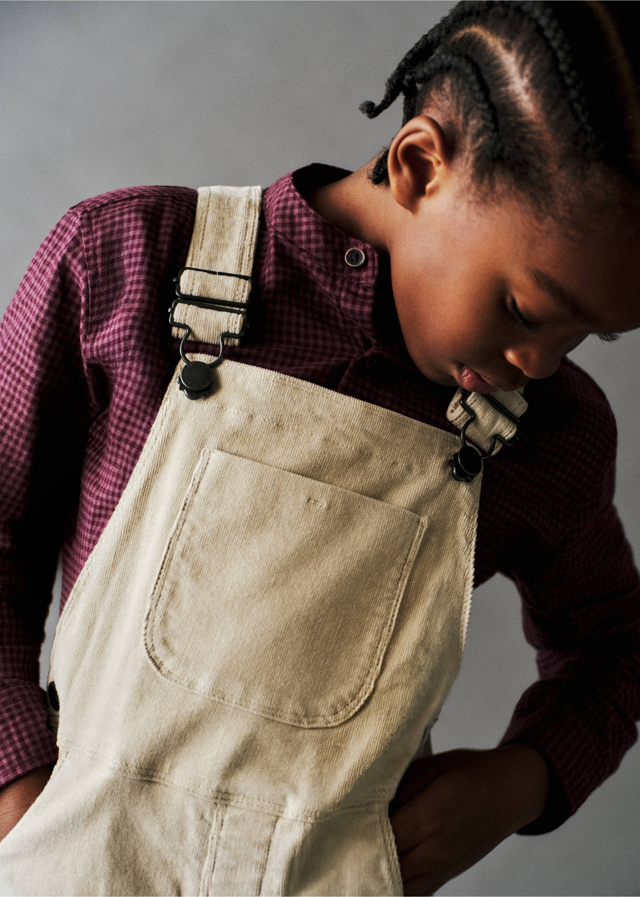 Beige corduroy dungarees with a chest pocket, worn over a patterned shirt., Beige. Ref: 37097124-00.