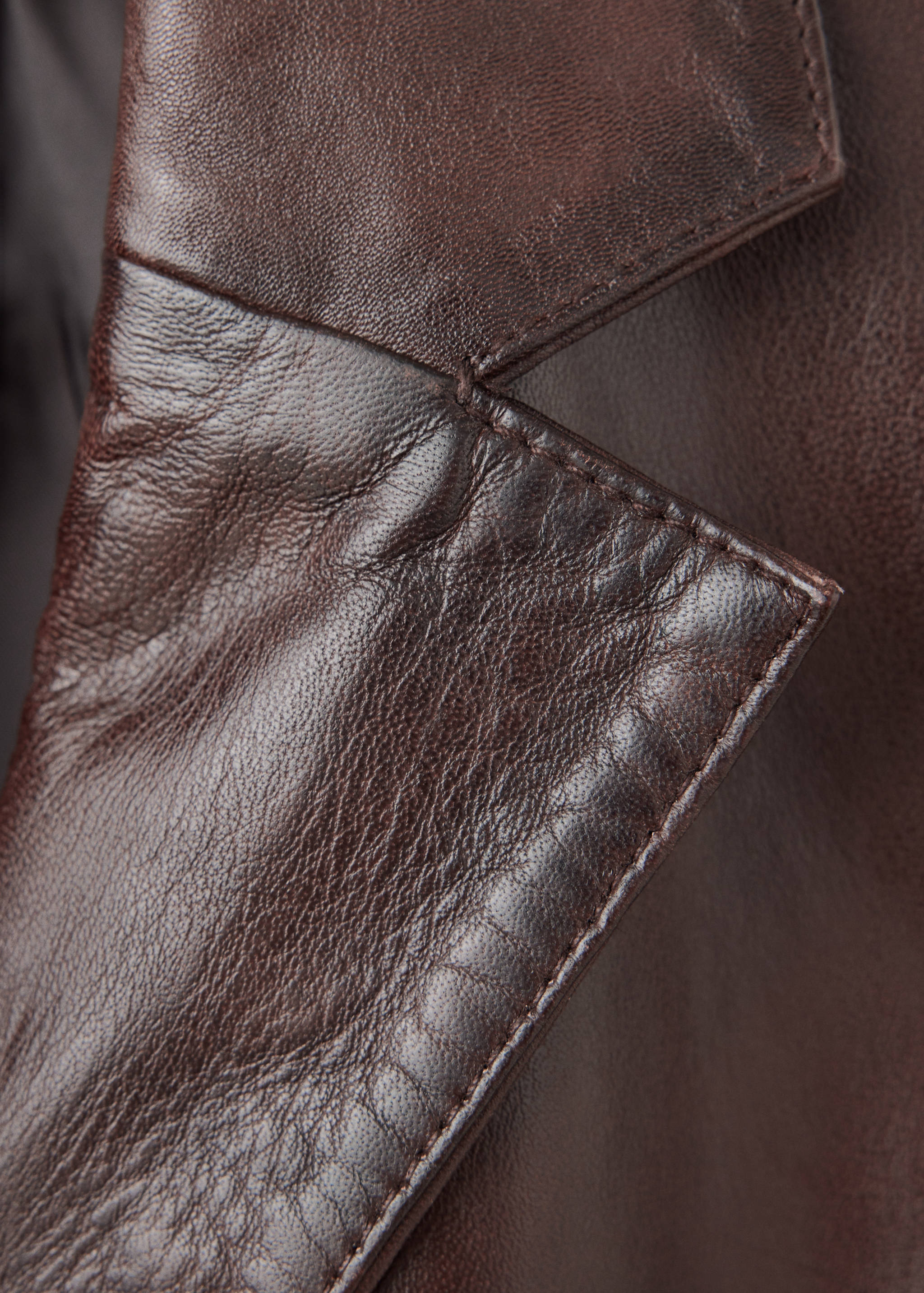 Brown leather blazer fabric detail