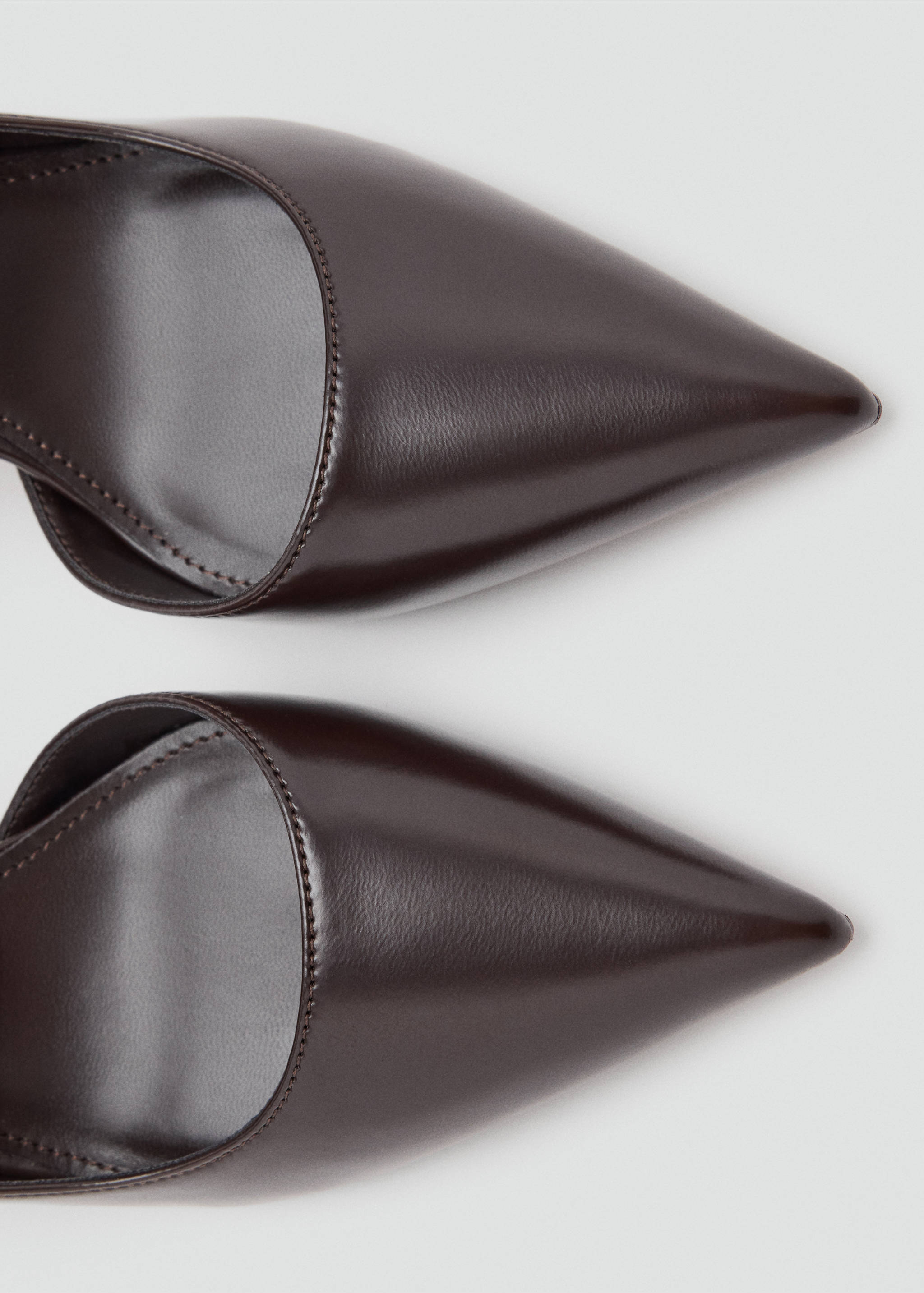 Close-up of dark brown pointed shoes with top-stitched trim., Brown. Ref: 37097774-00.