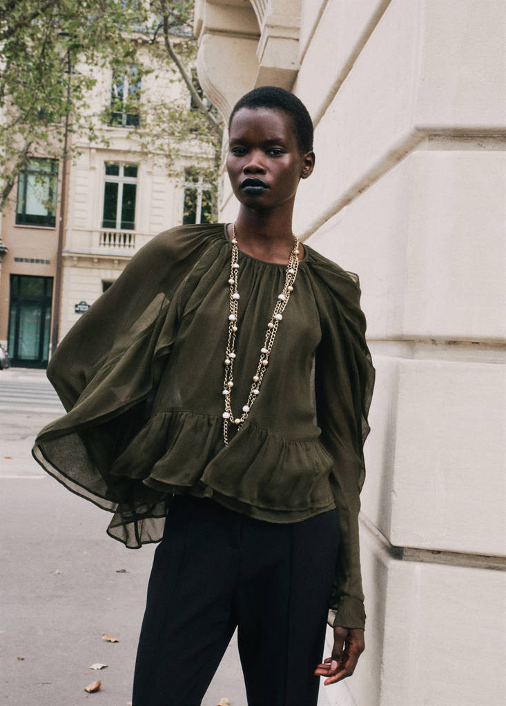 Semi-transparent ruffled blouse by Mango