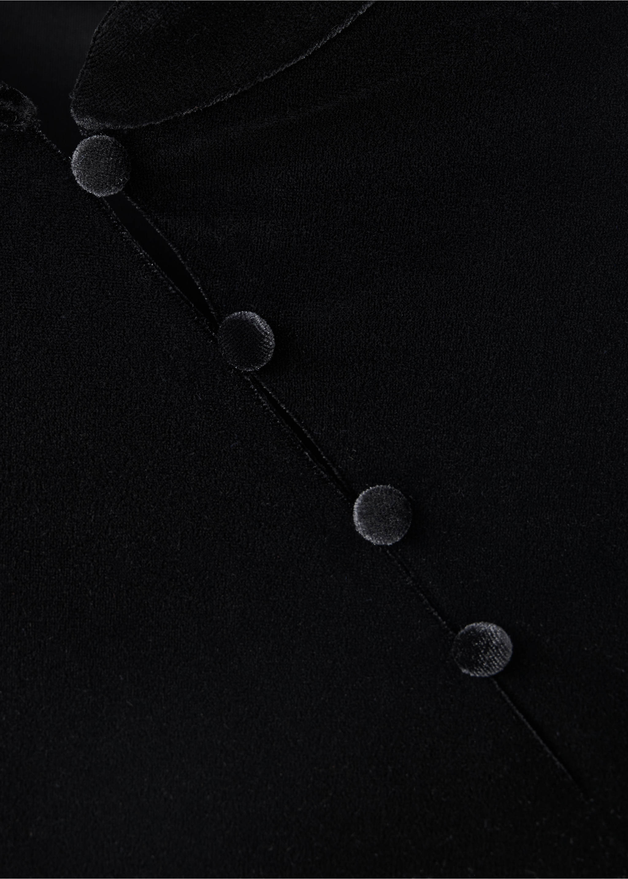 Close-up of a black velvet top with a high collar and covered buttons., Black. Ref: 37097794-00.