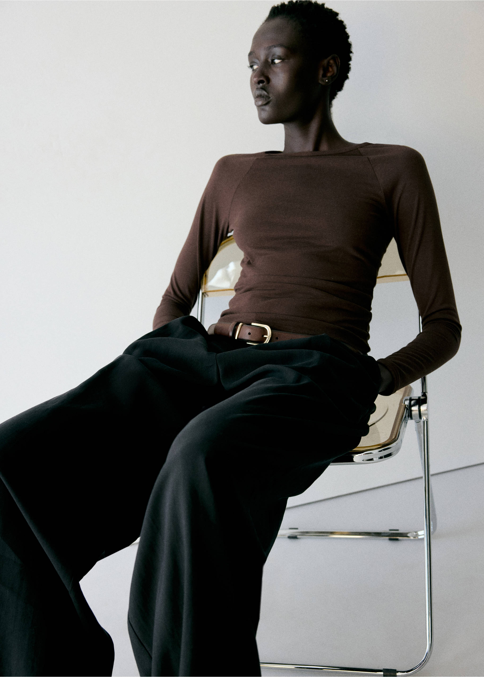 Brown long-sleeved t-shirt with a boat neckline, styled with black trousers., Chocolate. Ref: 37097800-00.