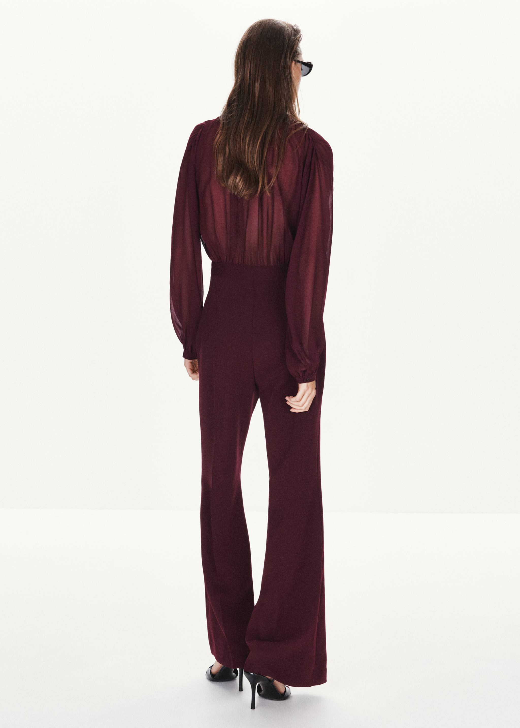 Combined jumpsuit with bow closure - Reverse of the article