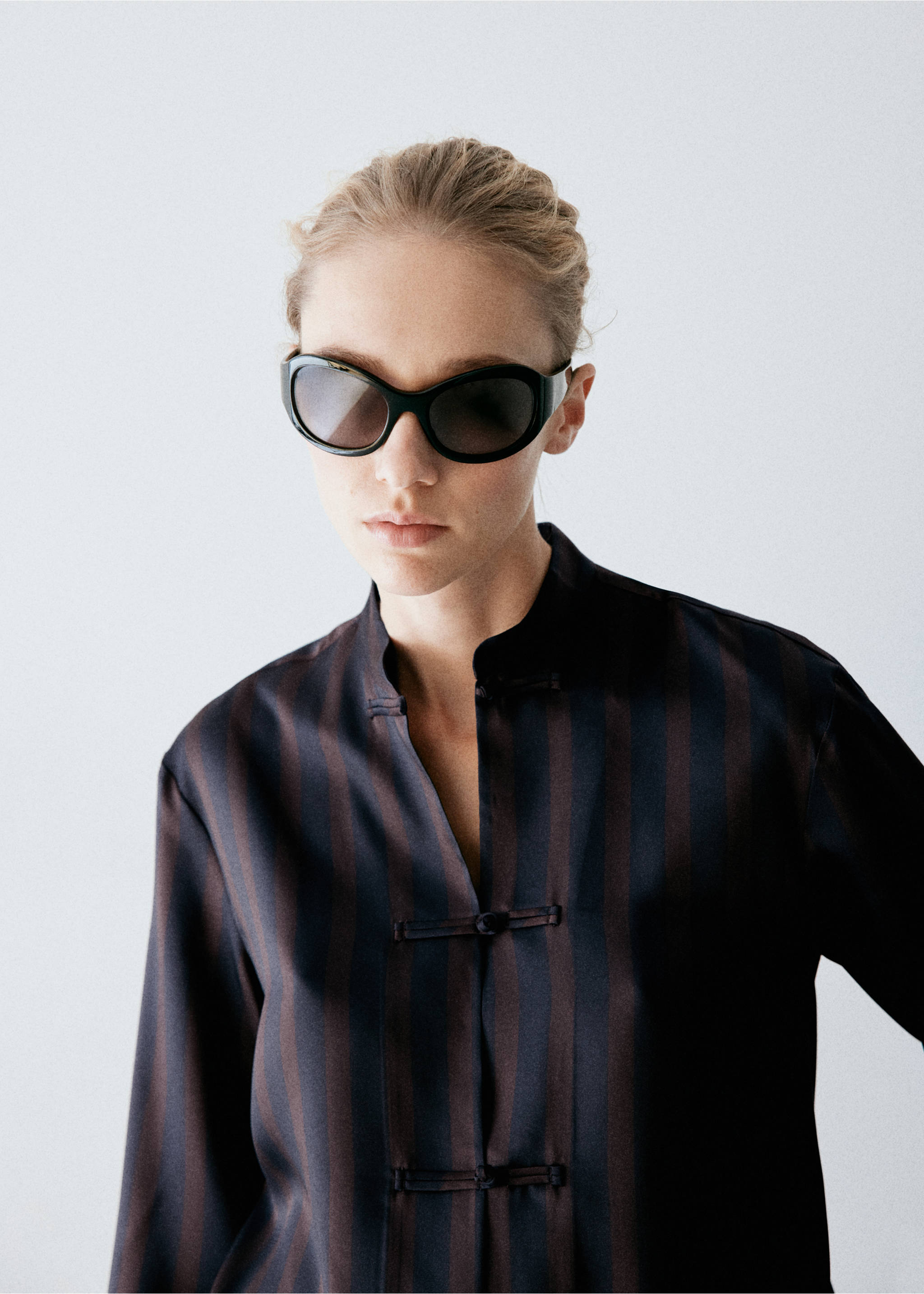 Striped blouse with frogging details - Details of the article 1, Dark Navy. Ref: 37097812-00.