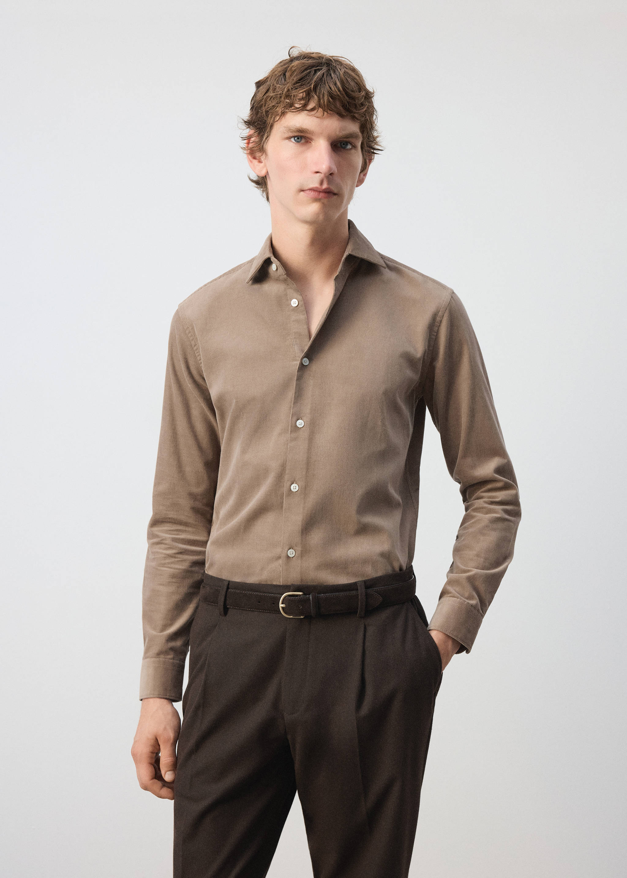 Brown long-sleeved button-down shirt with a classic collar.