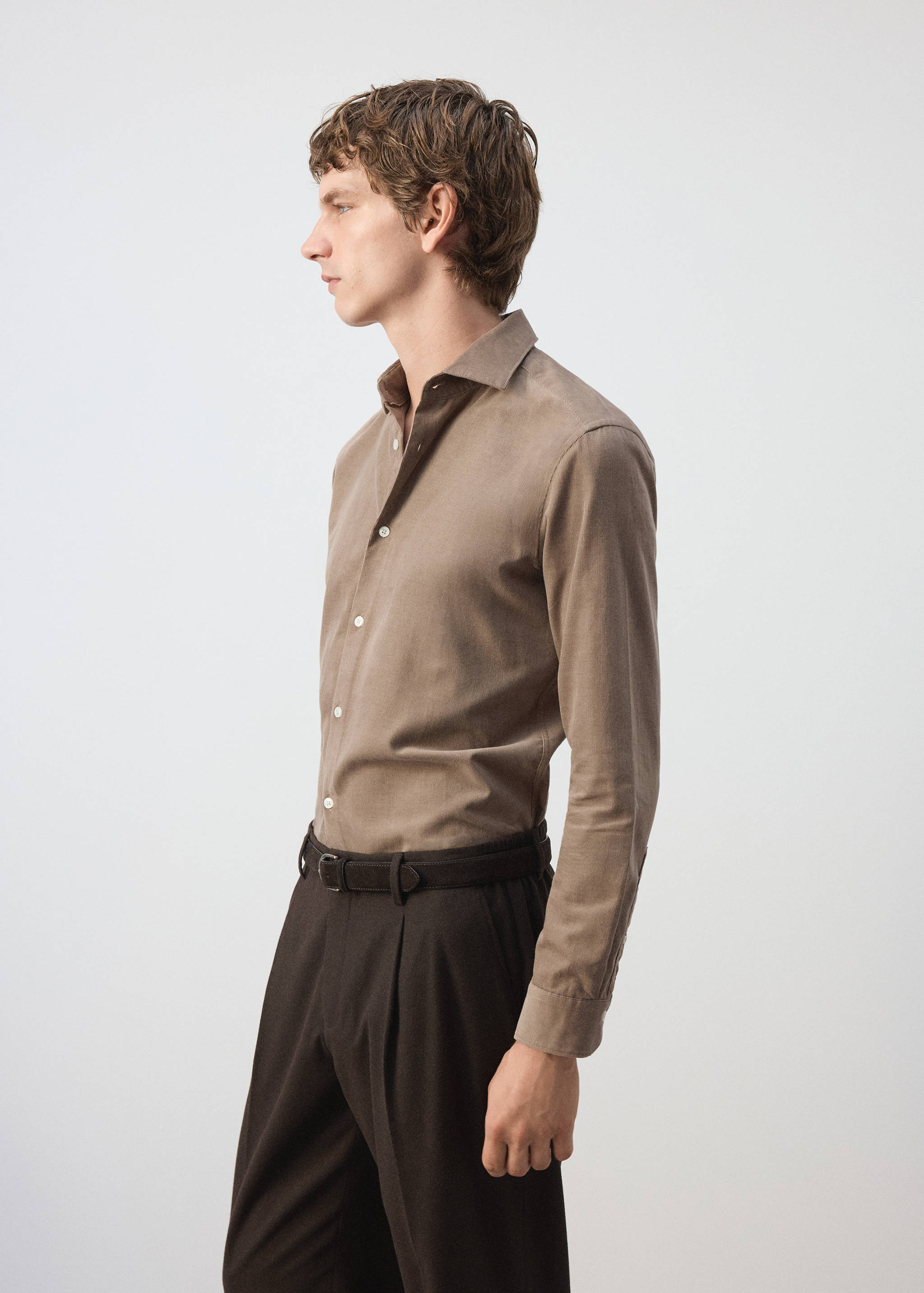 Brown long-sleeved shirt with a classic collar and button-up front.