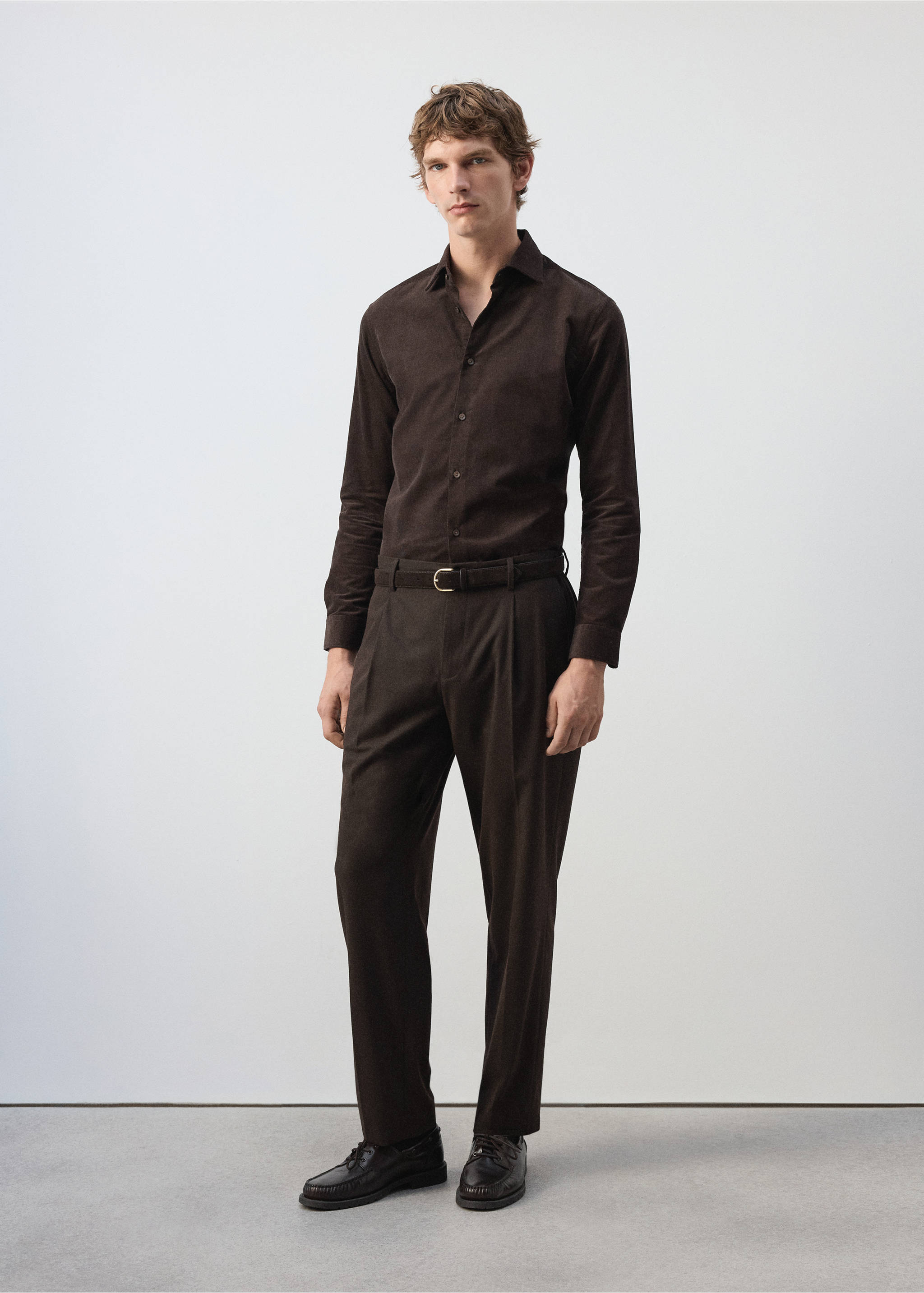 Dark brown long-sleeved shirt with a classic collar and button placket, worn with matching trousers., Brown. Ref: 37097883-00.