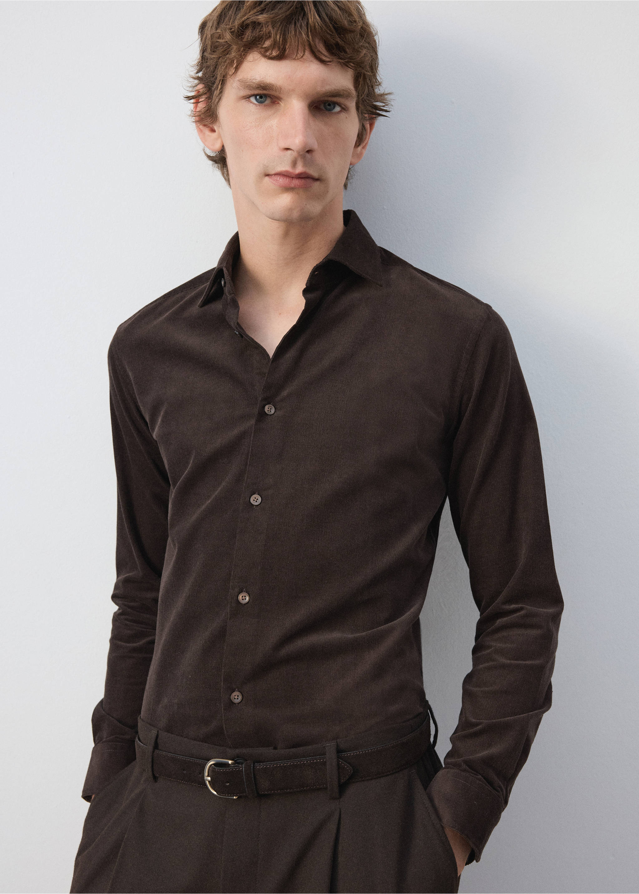 Dark brown long-sleeved shirt with a classic collar and front buttons, worn by a male model., Brown. Ref: 37097883-00.