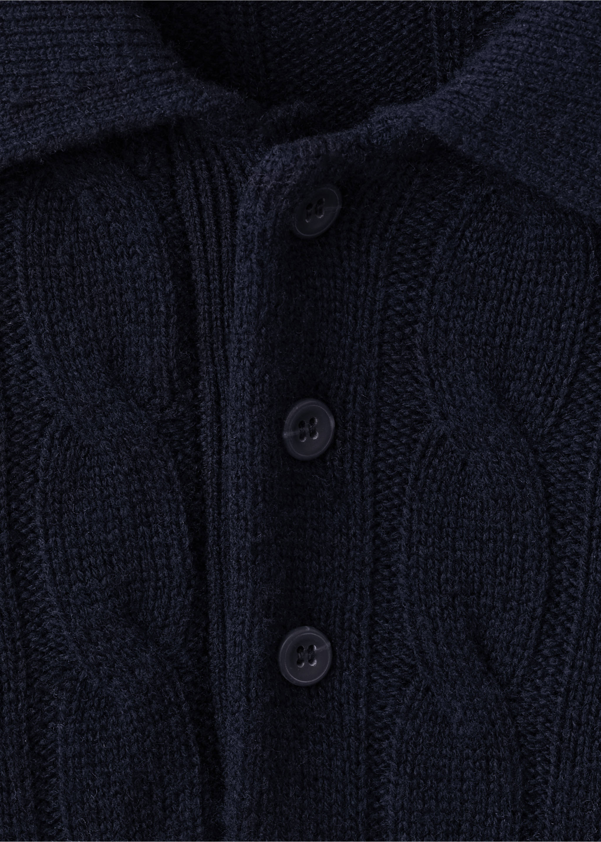 Close-up of a dark navy blue cable-knit polo shirt with a button placket., Navy. Ref: 37097885-00.
