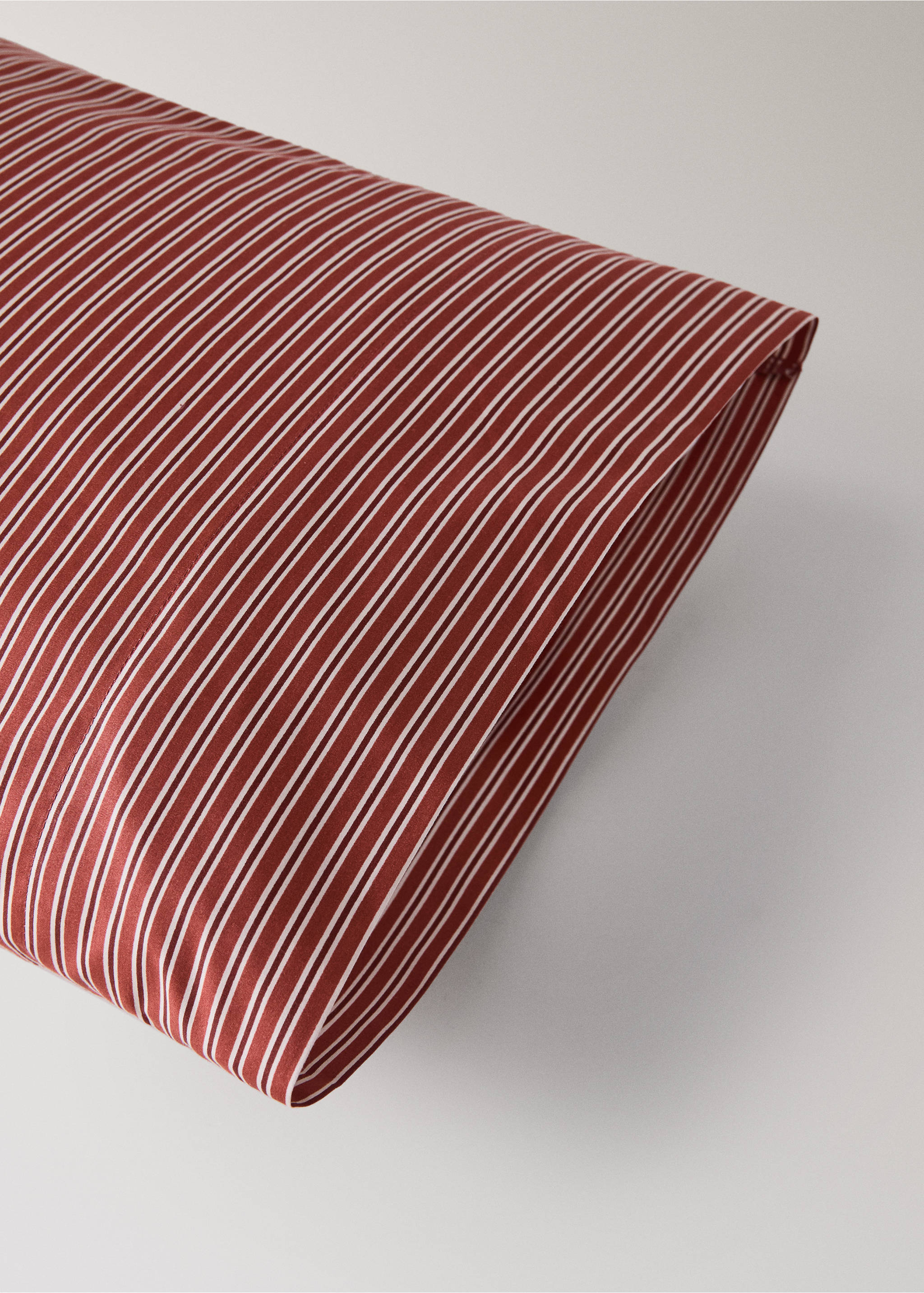 Rust red and white striped pillowcase detail., Red. Ref: 37097887-00.