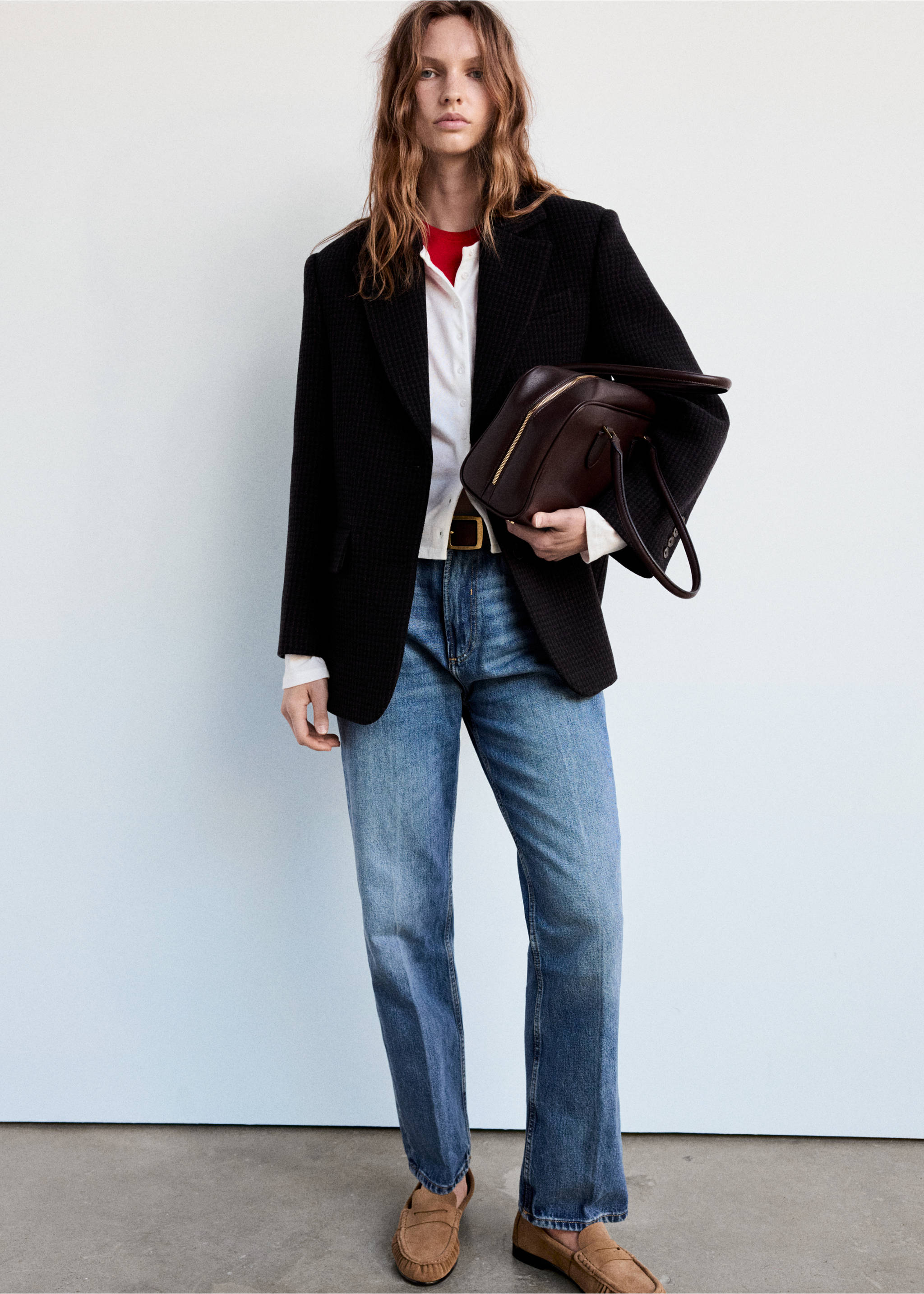 Black textured single-breasted blazer worn with a white shirt, blue jeans, and a dark burgundy handbag., Blue. Ref: 37097912-00.