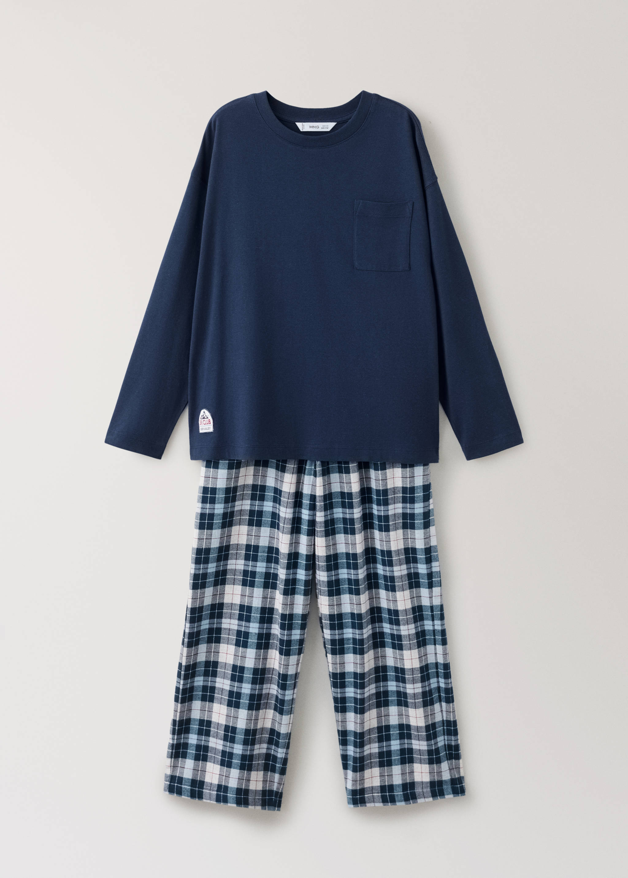 Navy blue pyjama set featuring a long-sleeved top and plaid trousers.