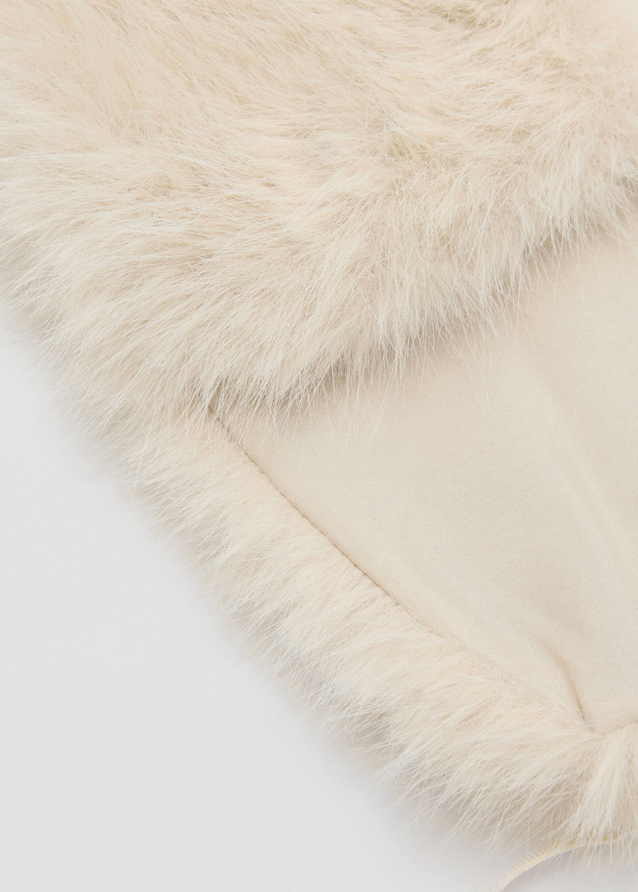 Cream faux-fur scarf shown in close-up detail.