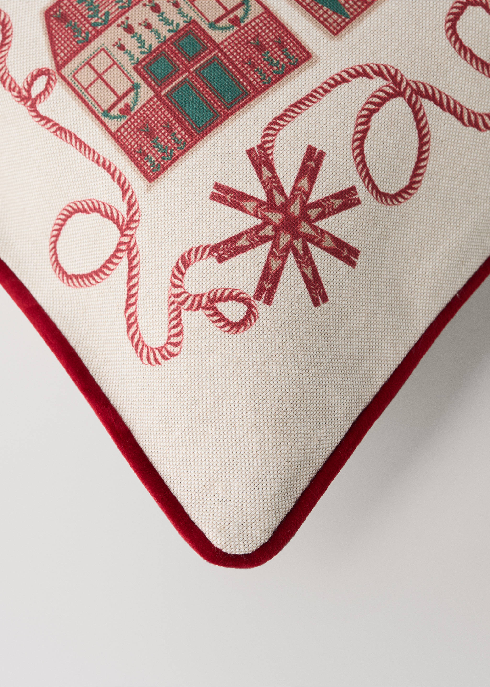 Cream cushion cover with a red and green Christmas pattern and red piping., Red. Ref: 37097934-00.