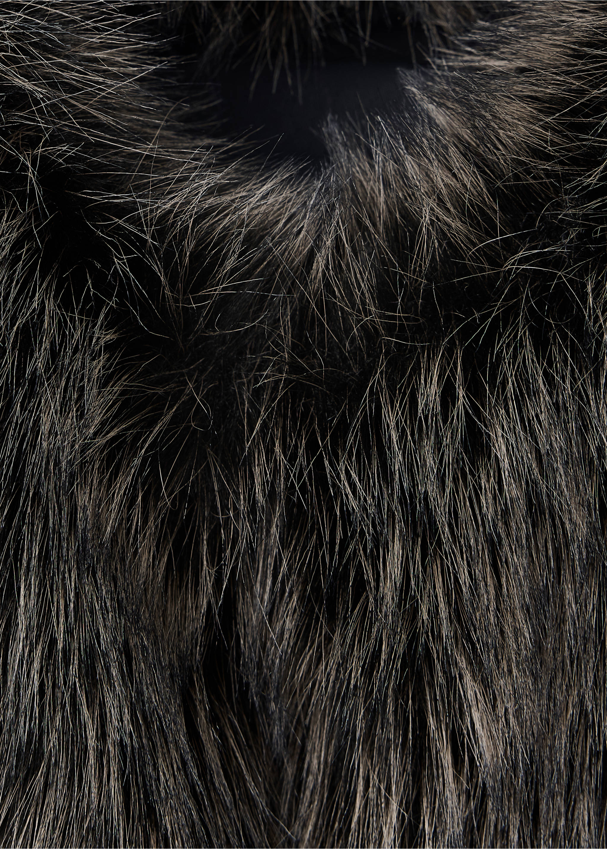 Close-up of a dark brown and grey faux-fur vest texture., Black. Ref: 37098261-00.