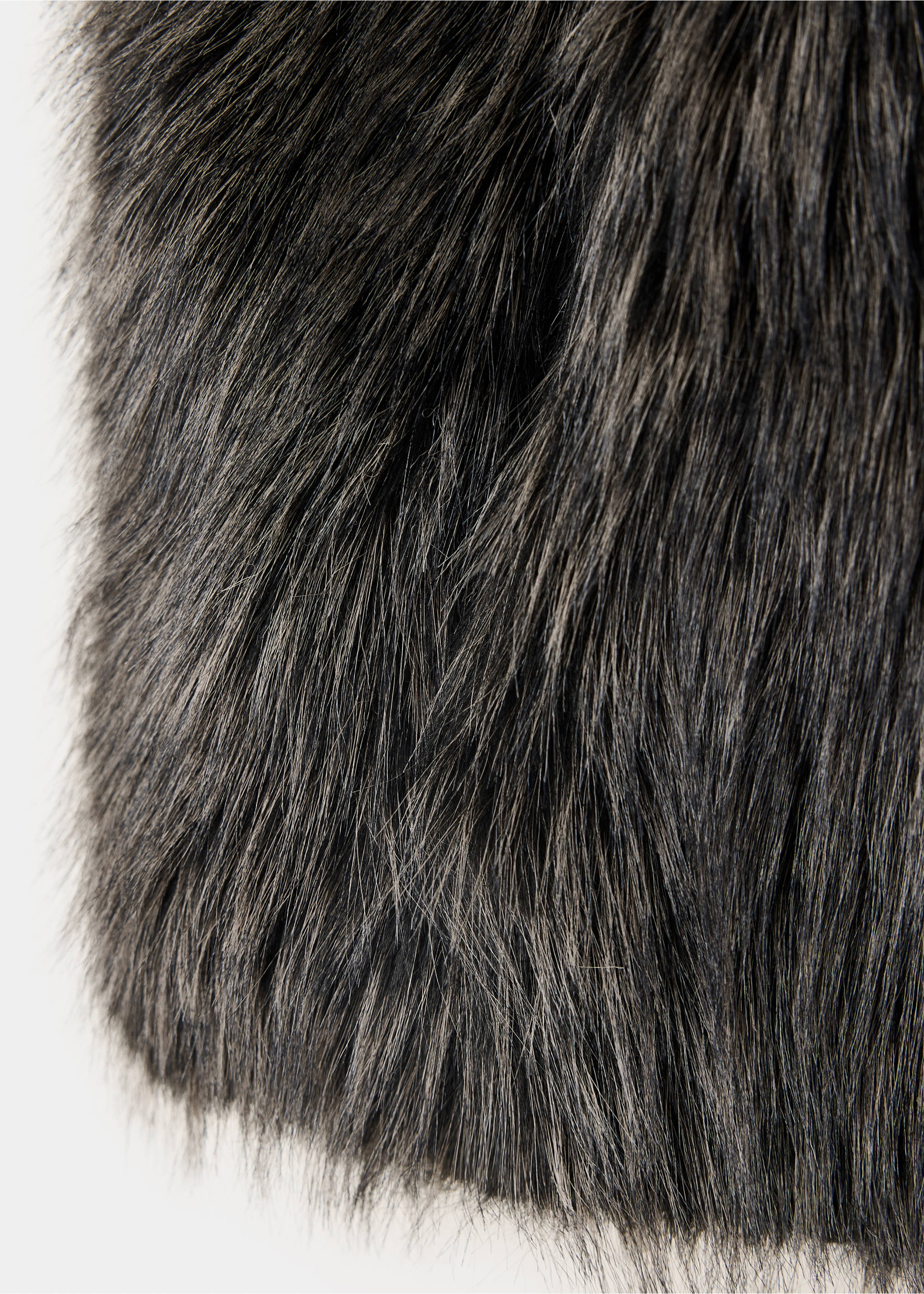 Close-up of dark grey faux-fur gilet texture., Black. Ref: 37098261-00.