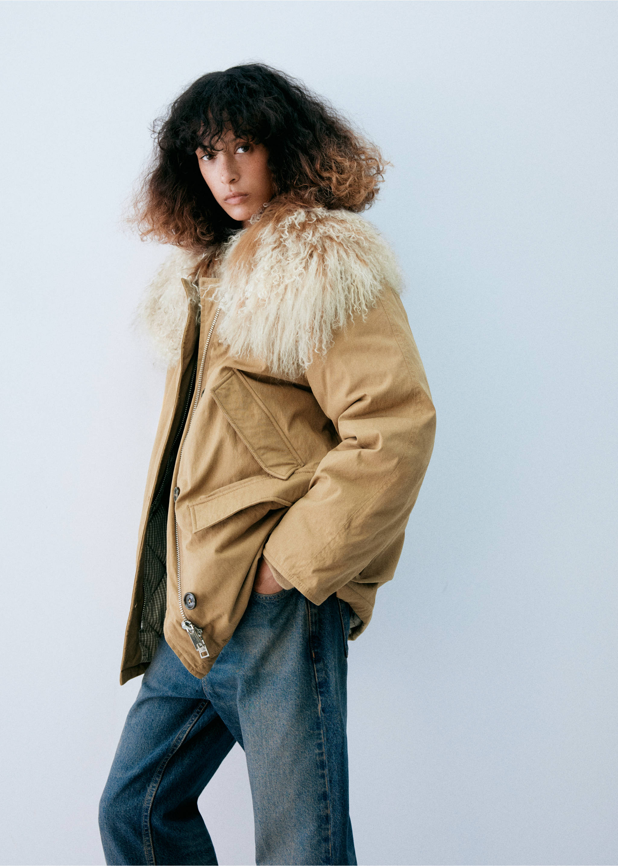 Camel parka with a fluffy cream faux-shearling collar and blue denim trousers., Beige. Ref: 37098264-00.