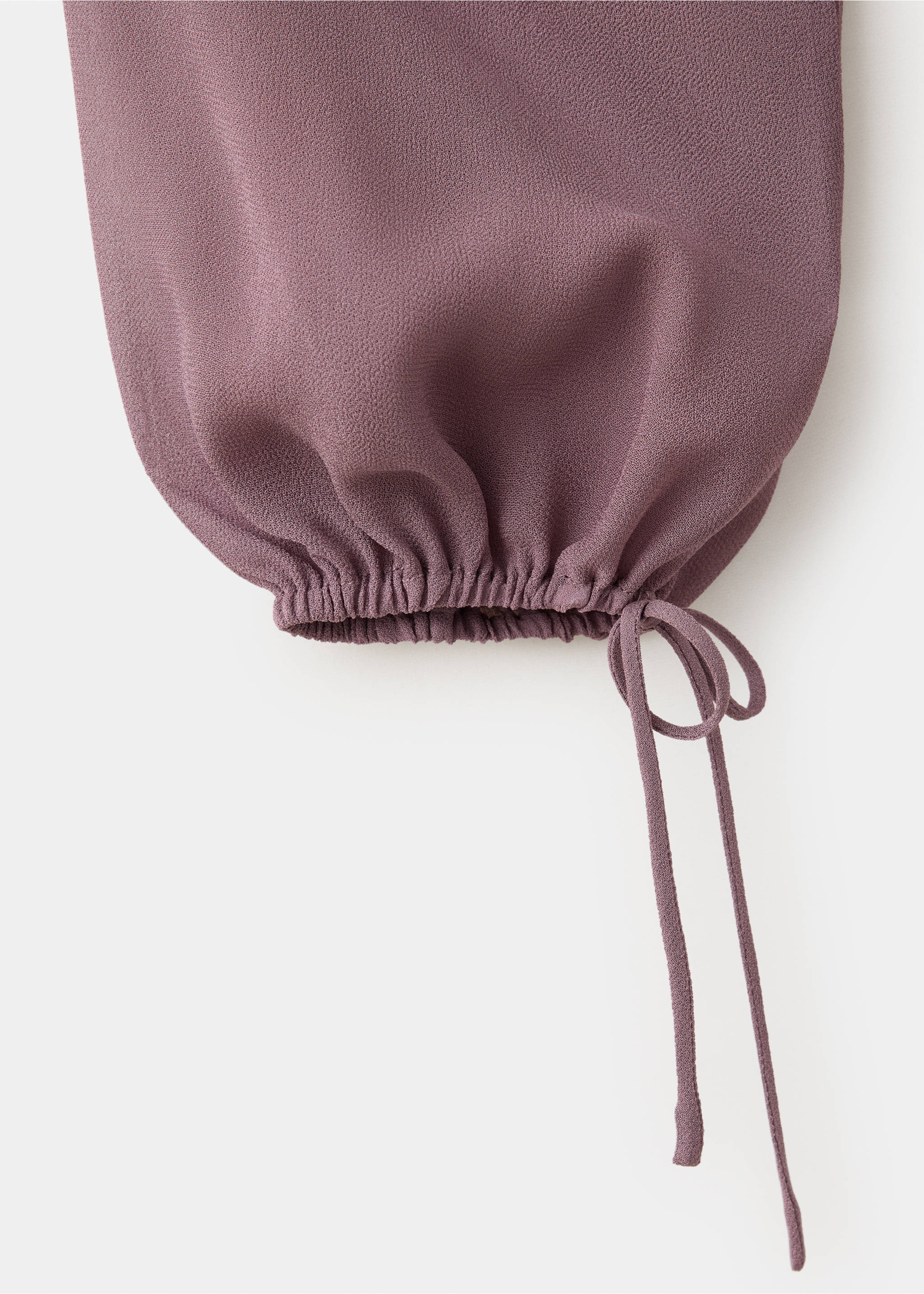 Mauve shirt fabric detail showing a gathered elastic cuff with drawstrings., Pink. Ref: 37098272-00.