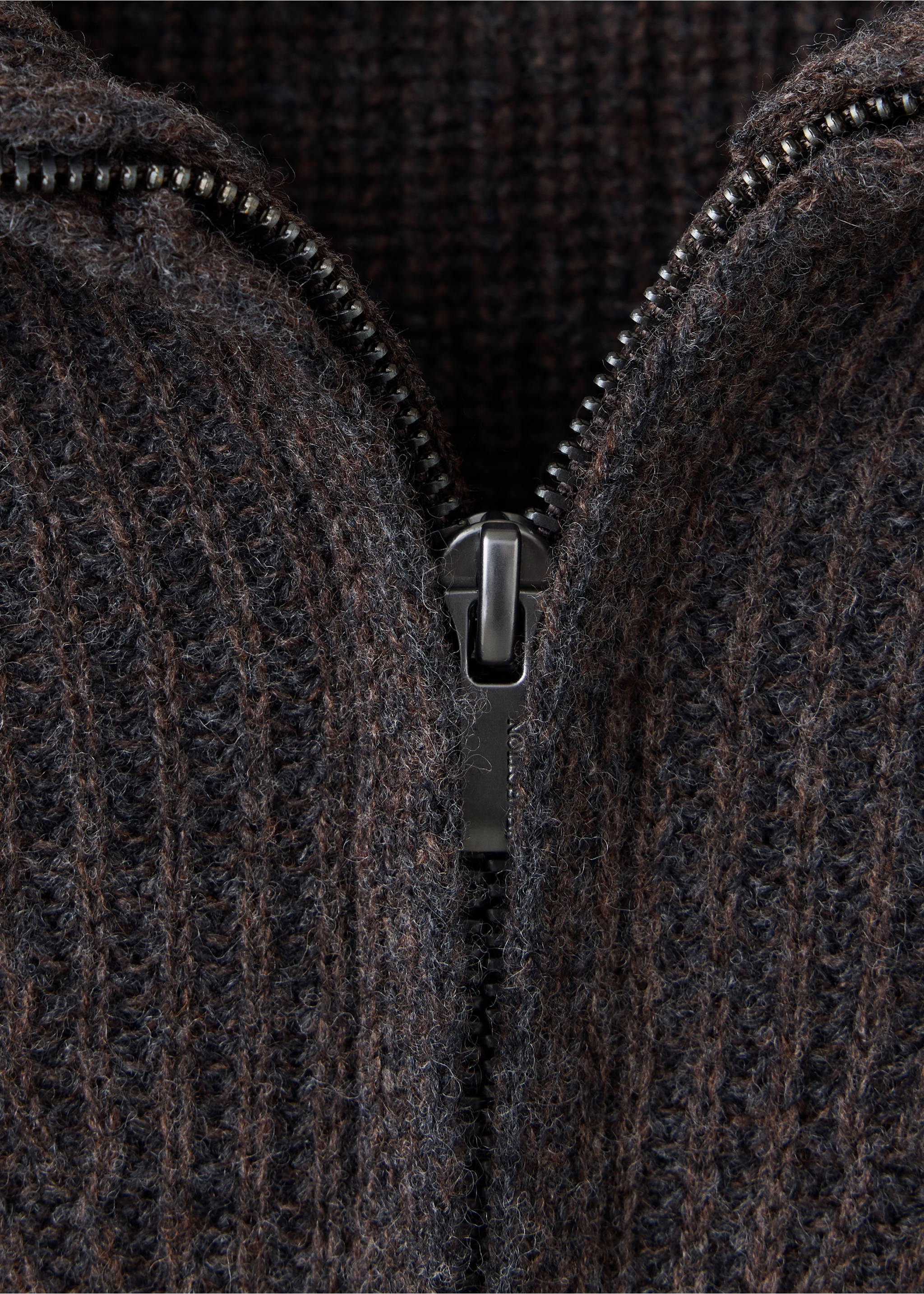 Close-up of a brown ribbed knit jersey with a metal zip., Chocolate. Ref: 37098273-00.