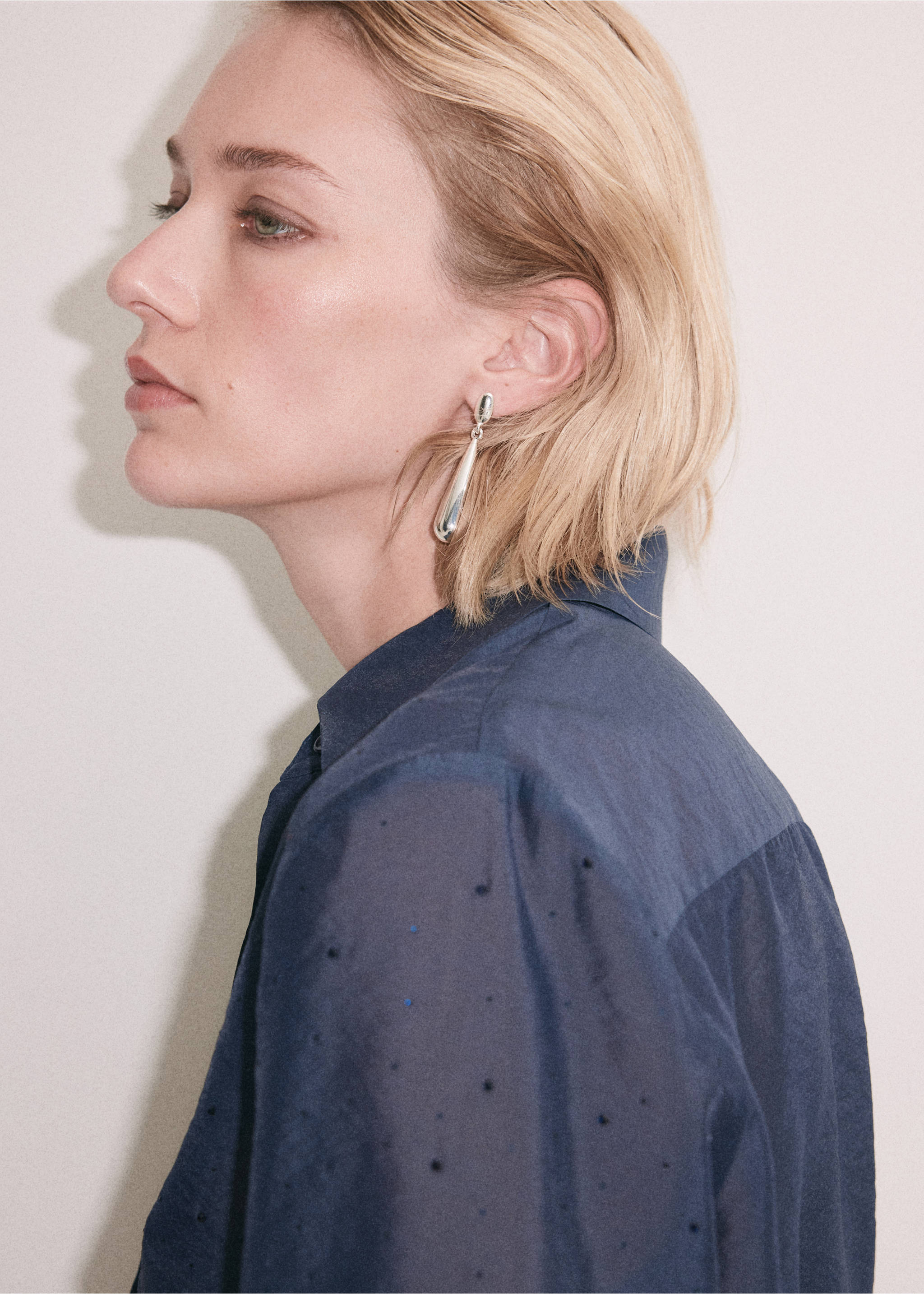Navy blue sheer shirt with dotted texture and classic collar, shown in close-up., Blue. Ref: 37099118-00.