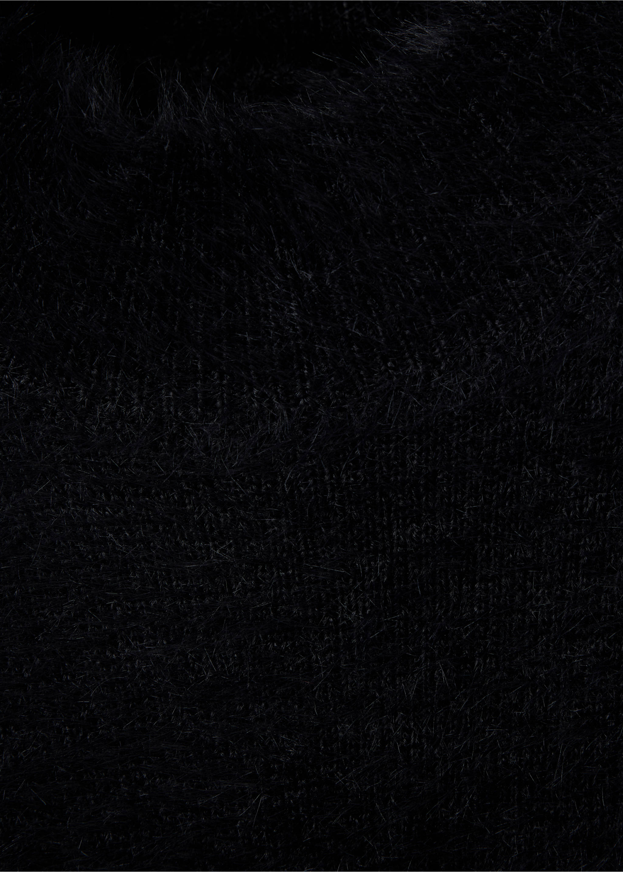 Close-up of the black knitted waistcoat's textured fuzzy yarn., Black. Ref: 37099120-00.