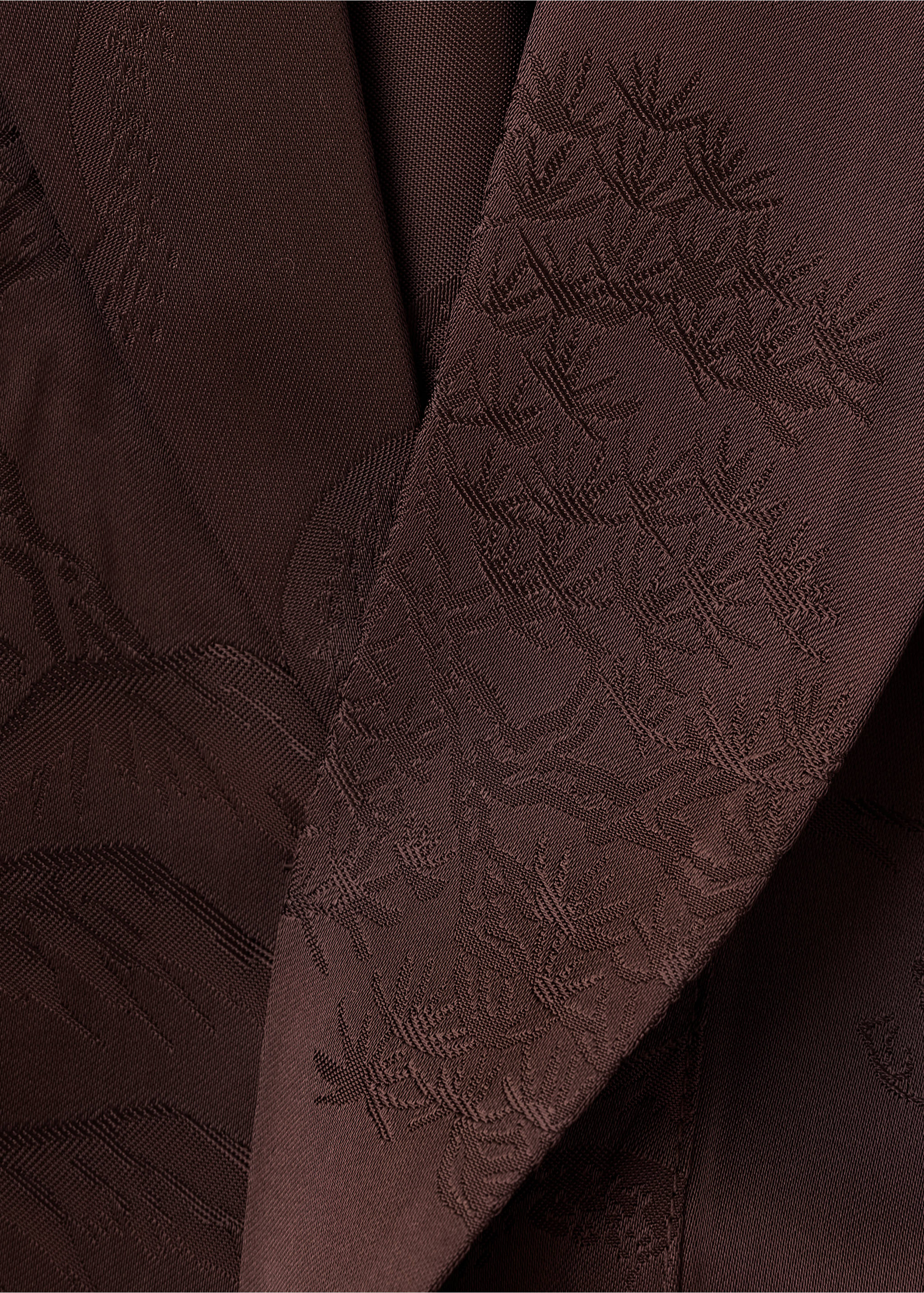 Dark brown blazer lapel detail with a woven botanical pattern., Brown. Ref: 37099128-00.