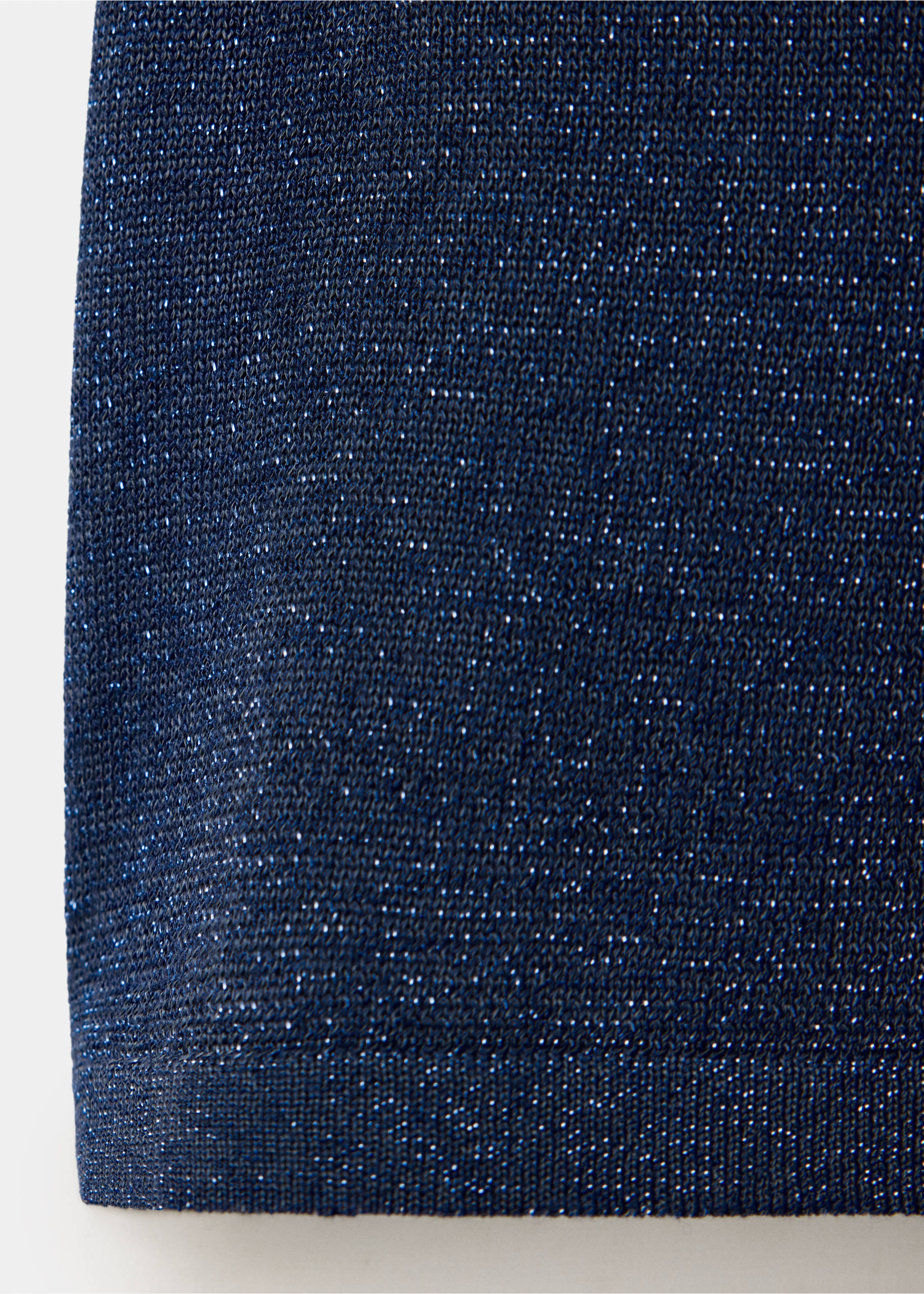 Close-up of a blue metallic knit top fabric., Navy. Ref: 37099134-00.