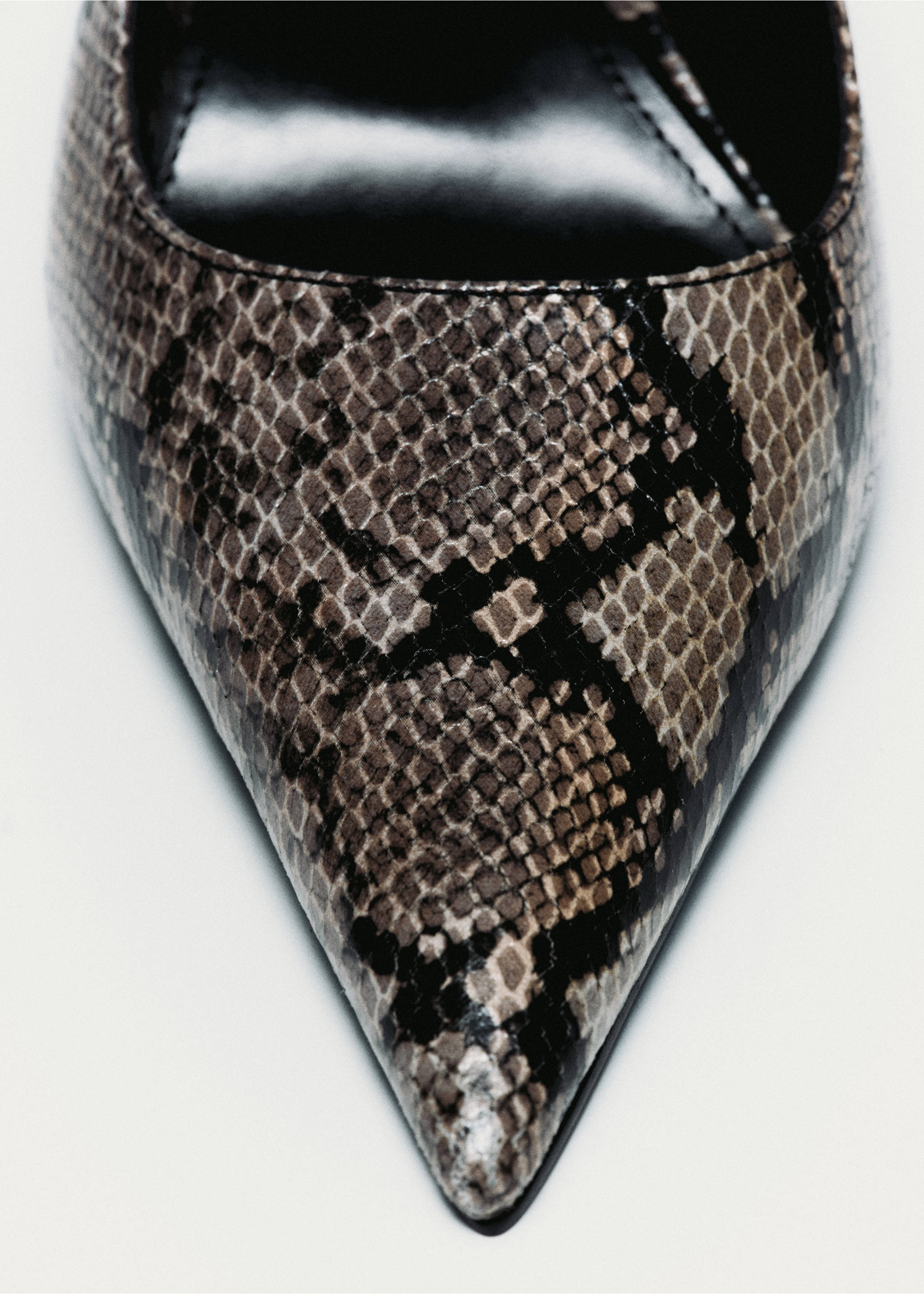 Close-up of a pointed-toe shoe with a brown and black animal print., Grey. Ref: 37099138-00.