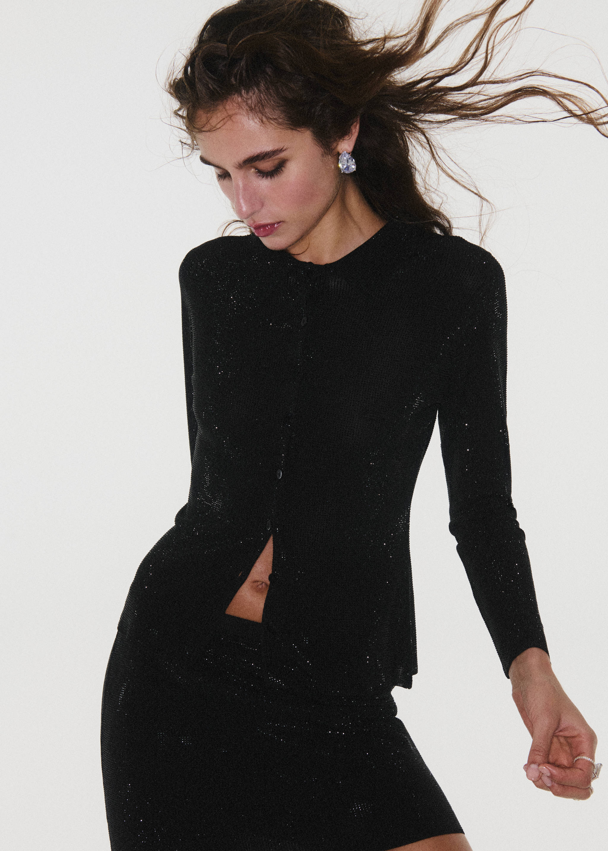 Black metallic-thread cardigan with long sleeves and a button-down front., Black. Ref: 37099142-00.