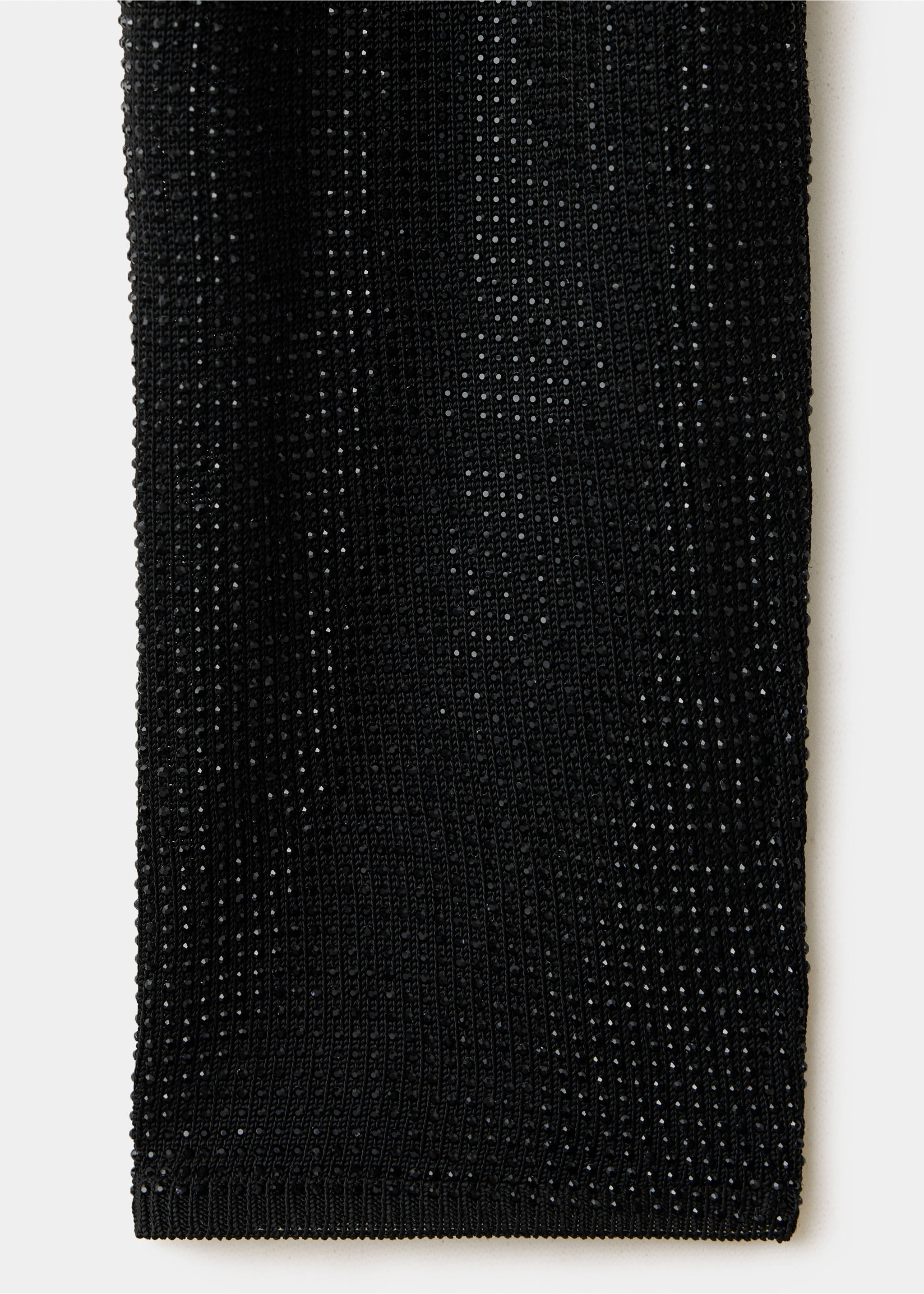 Primer plano del tejido de punto con abalorios del cárdigan negro., Negro. Ref: 37099142-00.