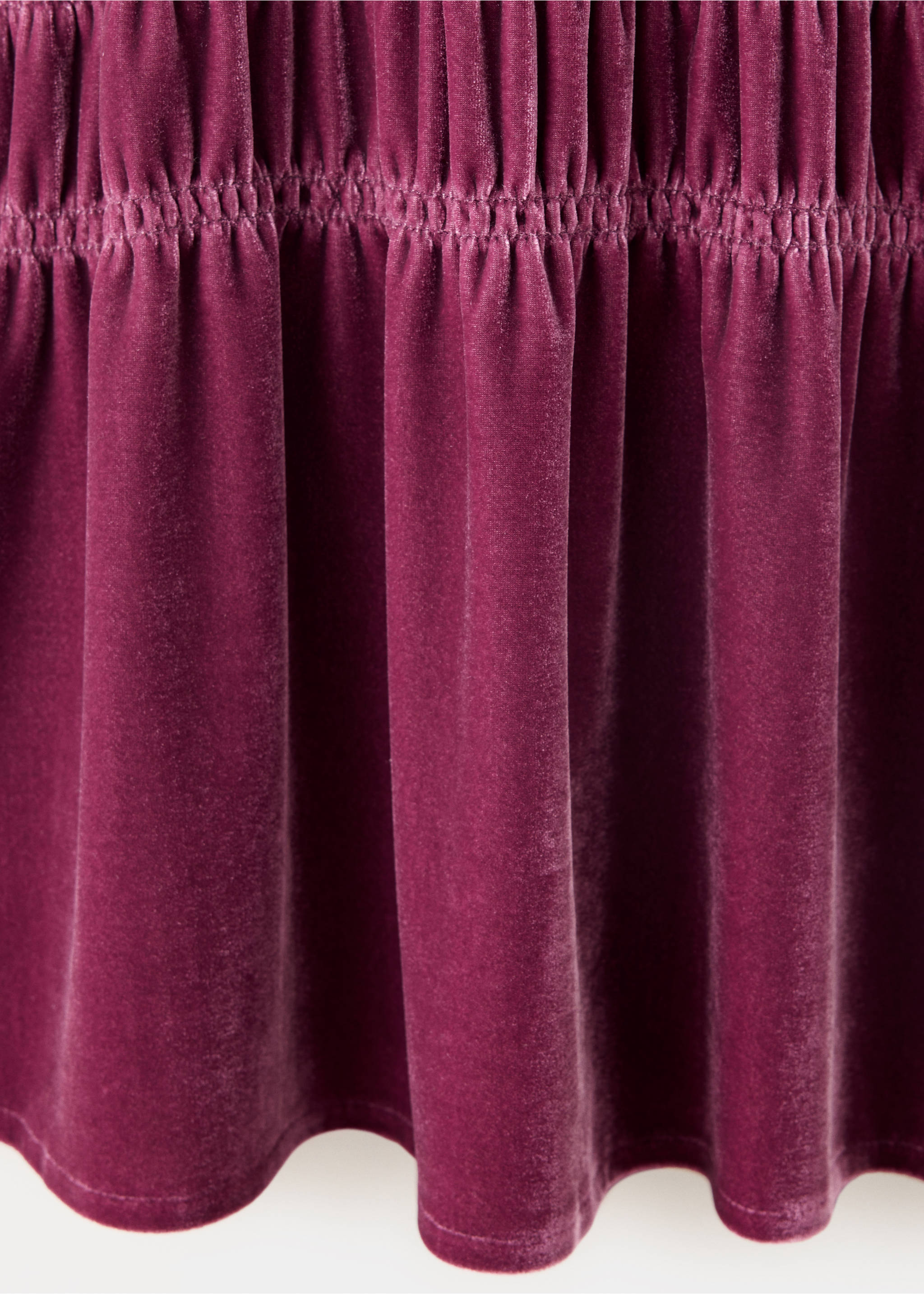 Magenta velvet dress detail showing smocked waist and gathered skirt., Cherry. Ref: 37099210-00.