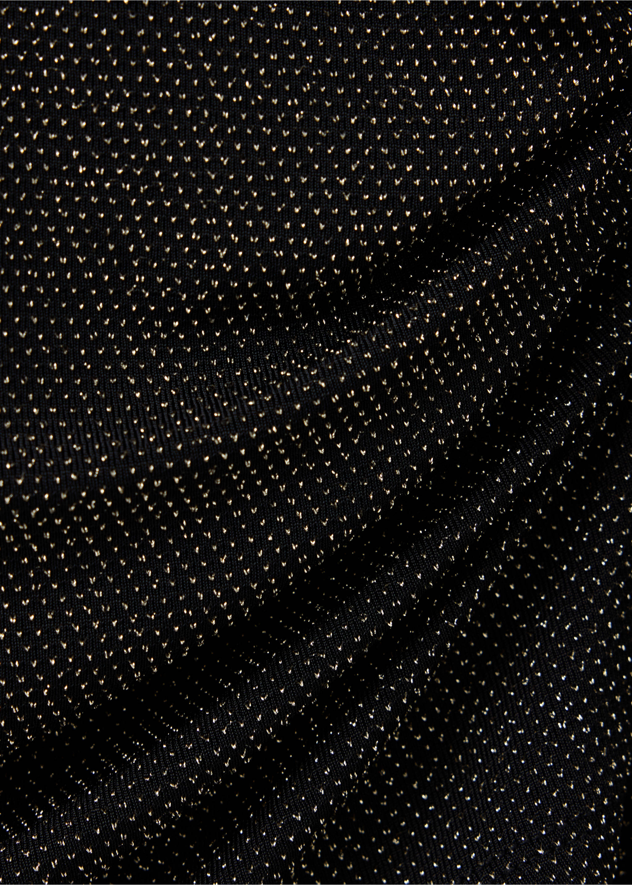 Close-up of a black t-shirt with a metallic gold dot pattern., Black. Ref: 37099219-00.