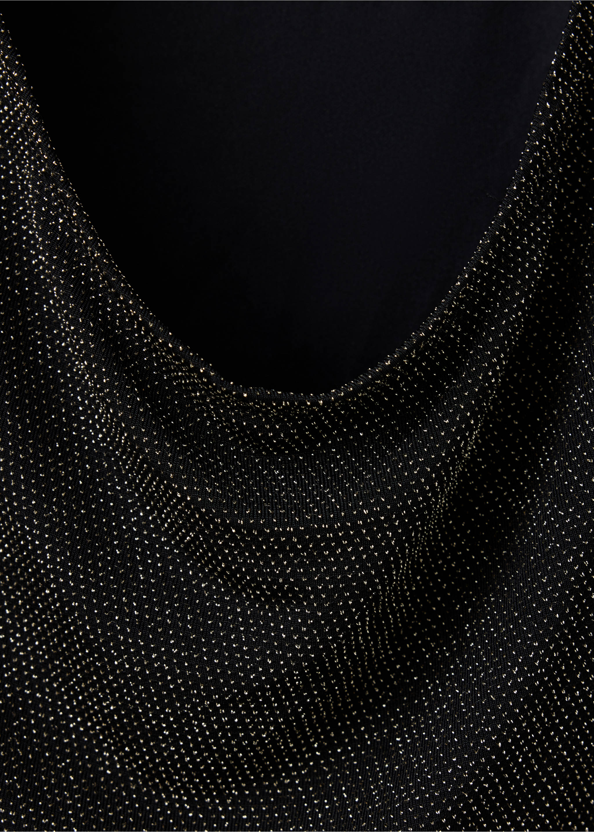Close-up of a black t-shirt fabric with a glittering gold metallic finish and cowl neckline., Black. Ref: 37099219-00.