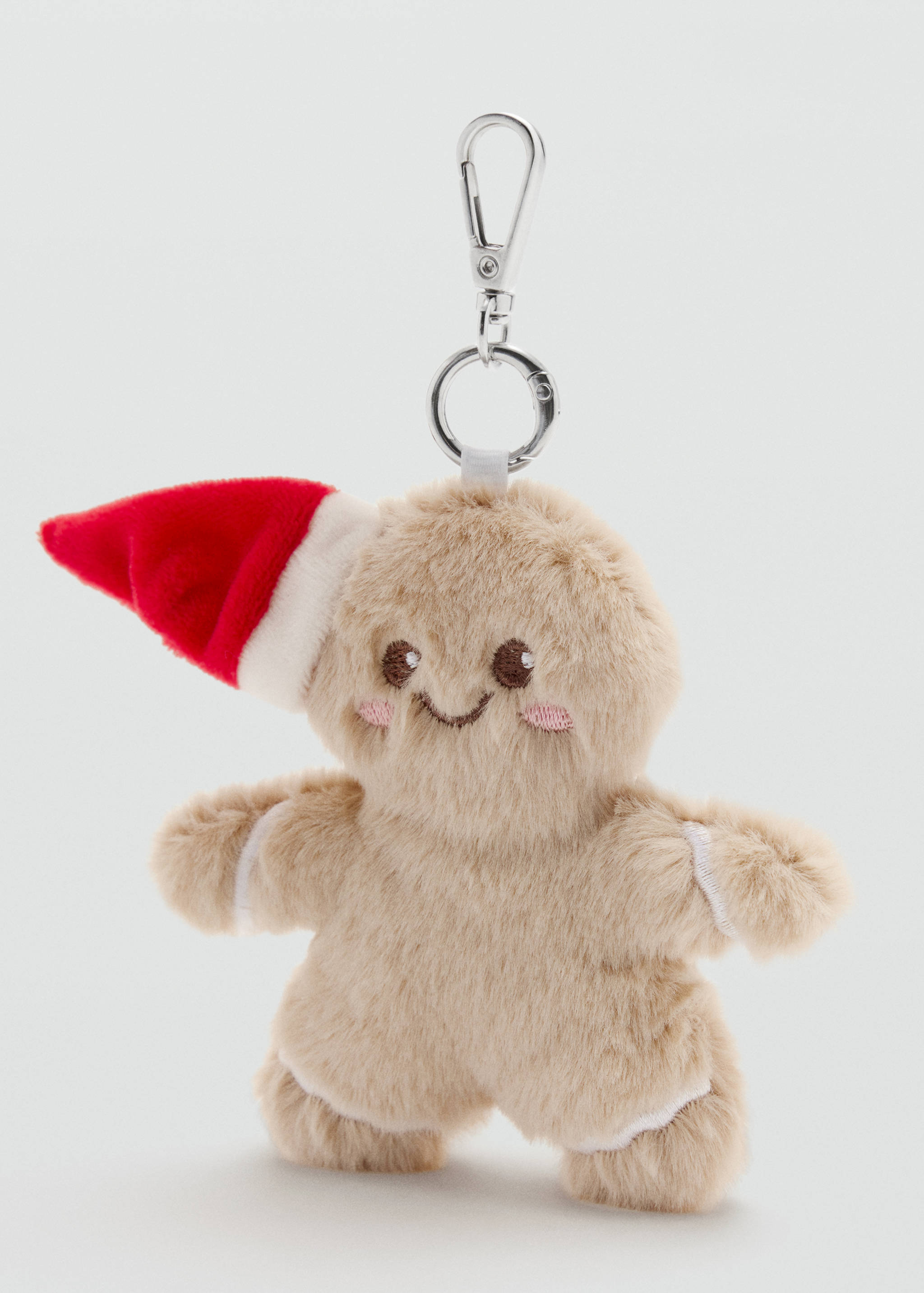 Plush gingerbread man keychain in light brown faux-fur with a Santa hat and silver-tone hardware.