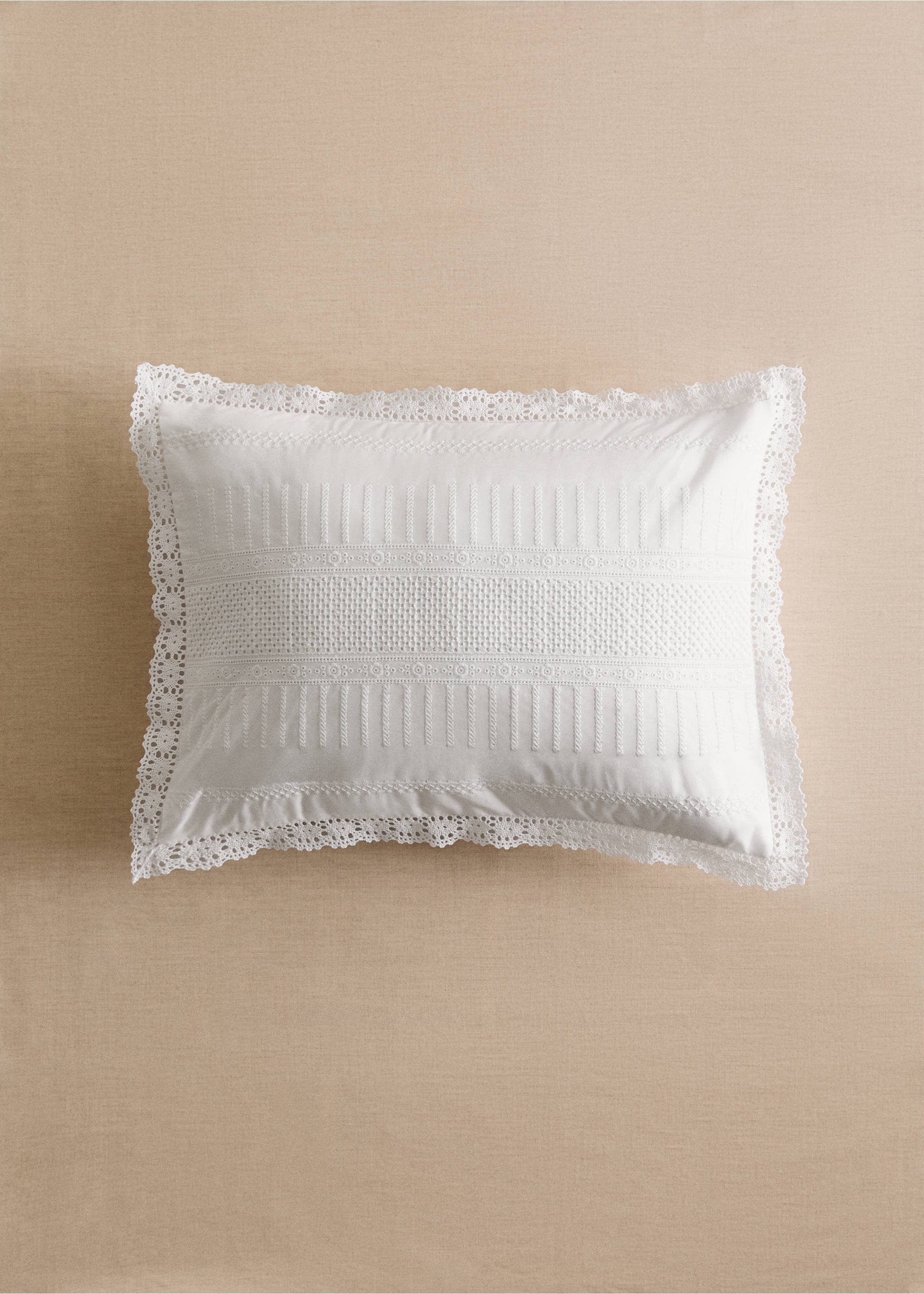 White cushion cover with lace trim and embroidered central band., White. Ref: 37141588-00.