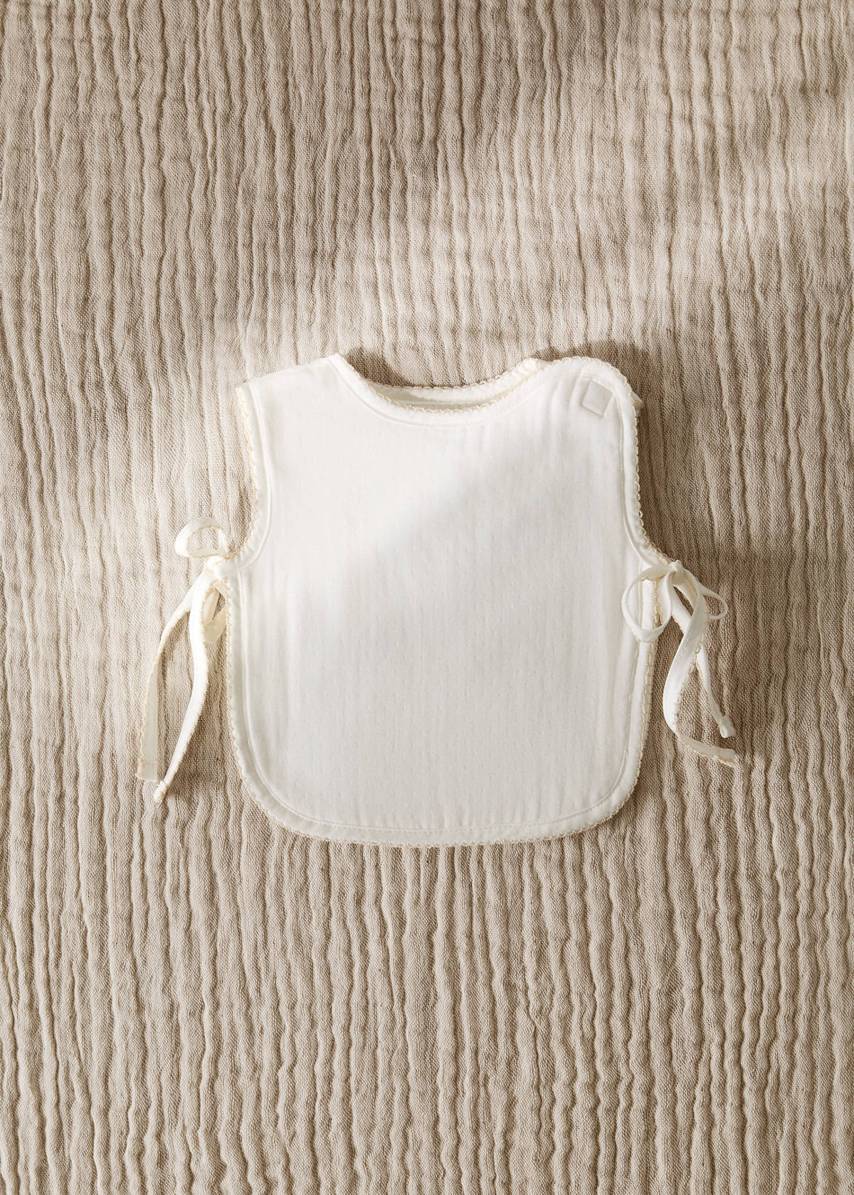Cotton bib with decorative trim — Medium Brown