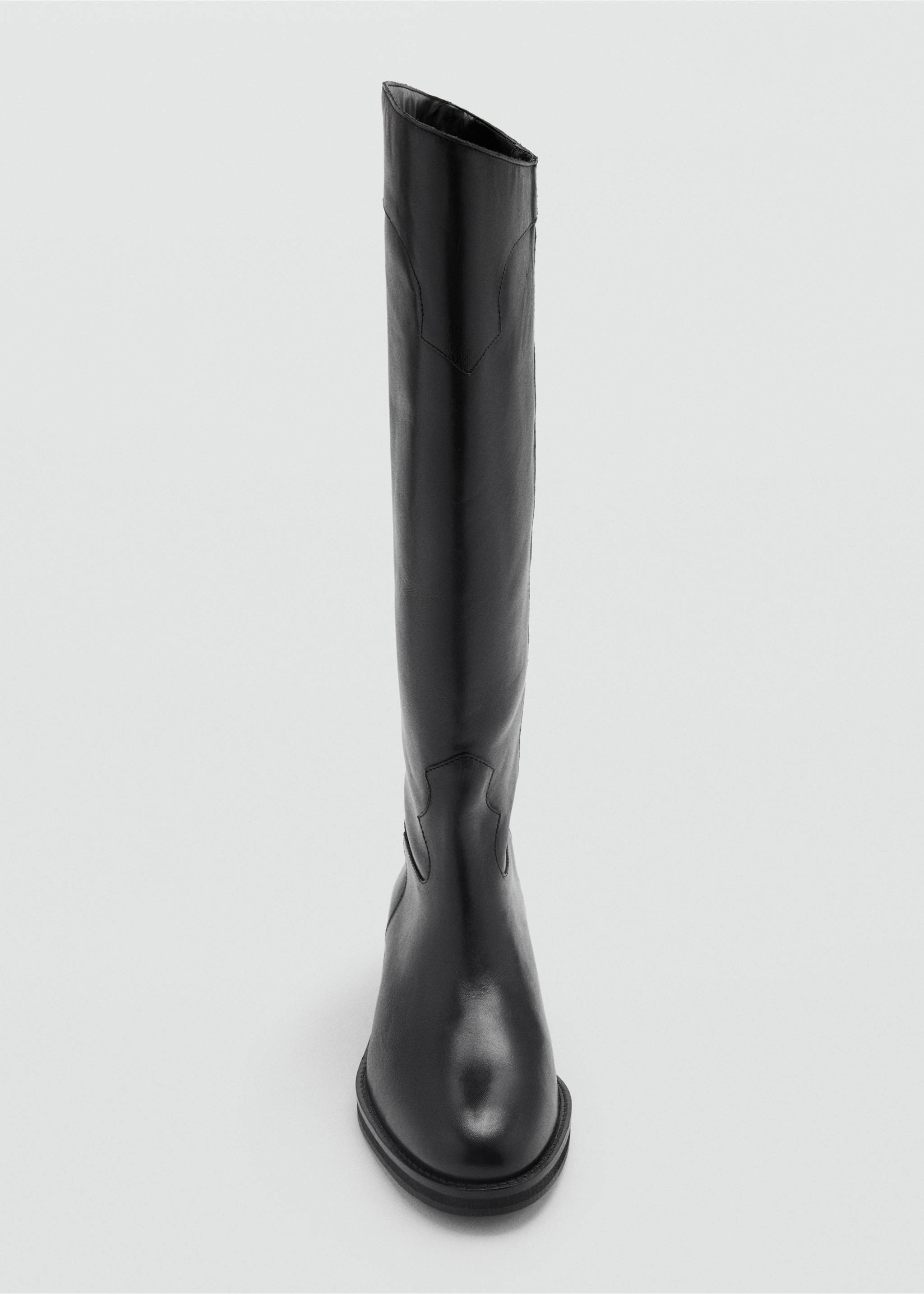 Close-up of a black knee-high boot., Black. Ref: 37966723-00.