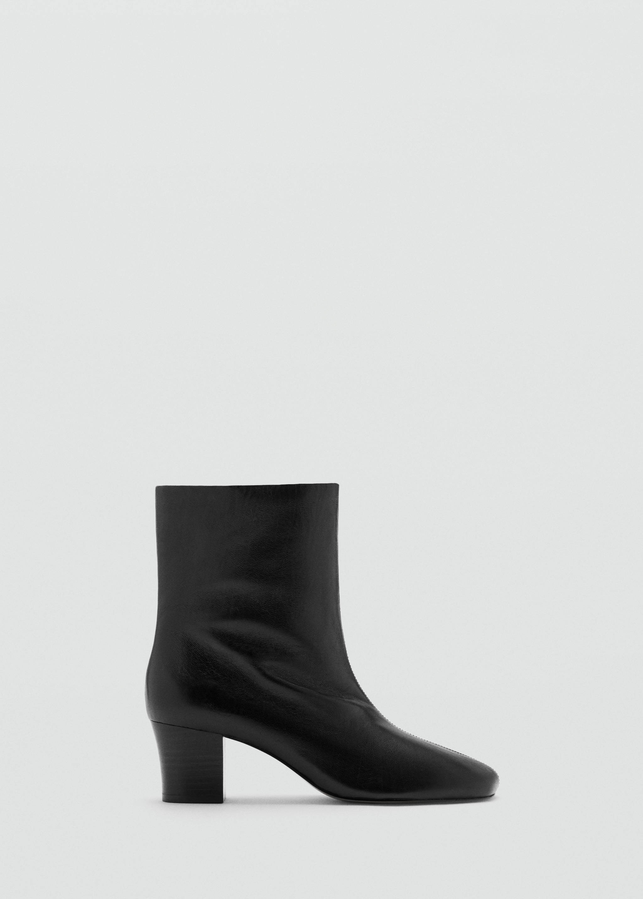Black ankle boot with a rounded toe and mid-height block heel.