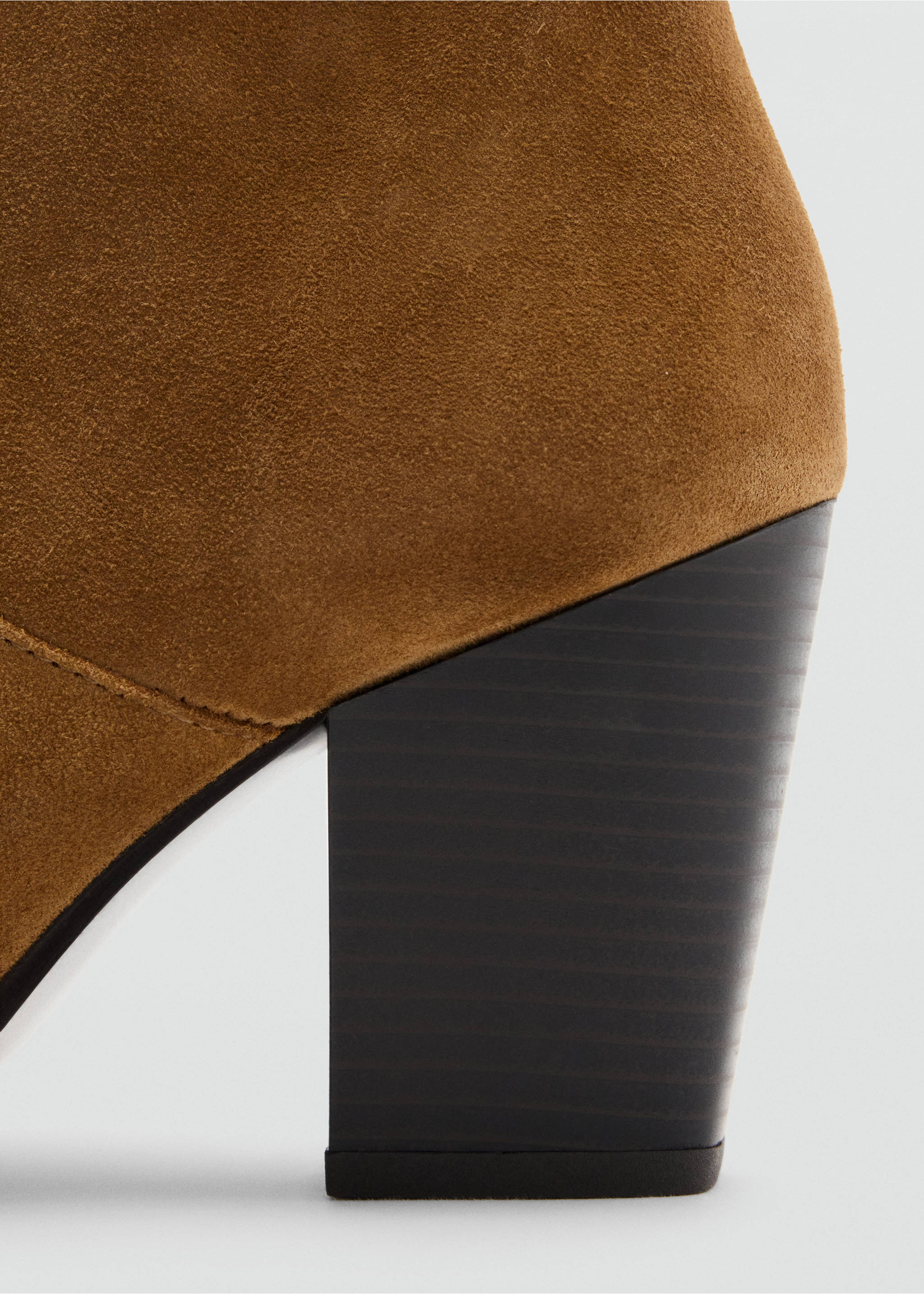 Close-up of a brown suede ankle boot heel., Tobacco Brown. Ref: 47001350-00.