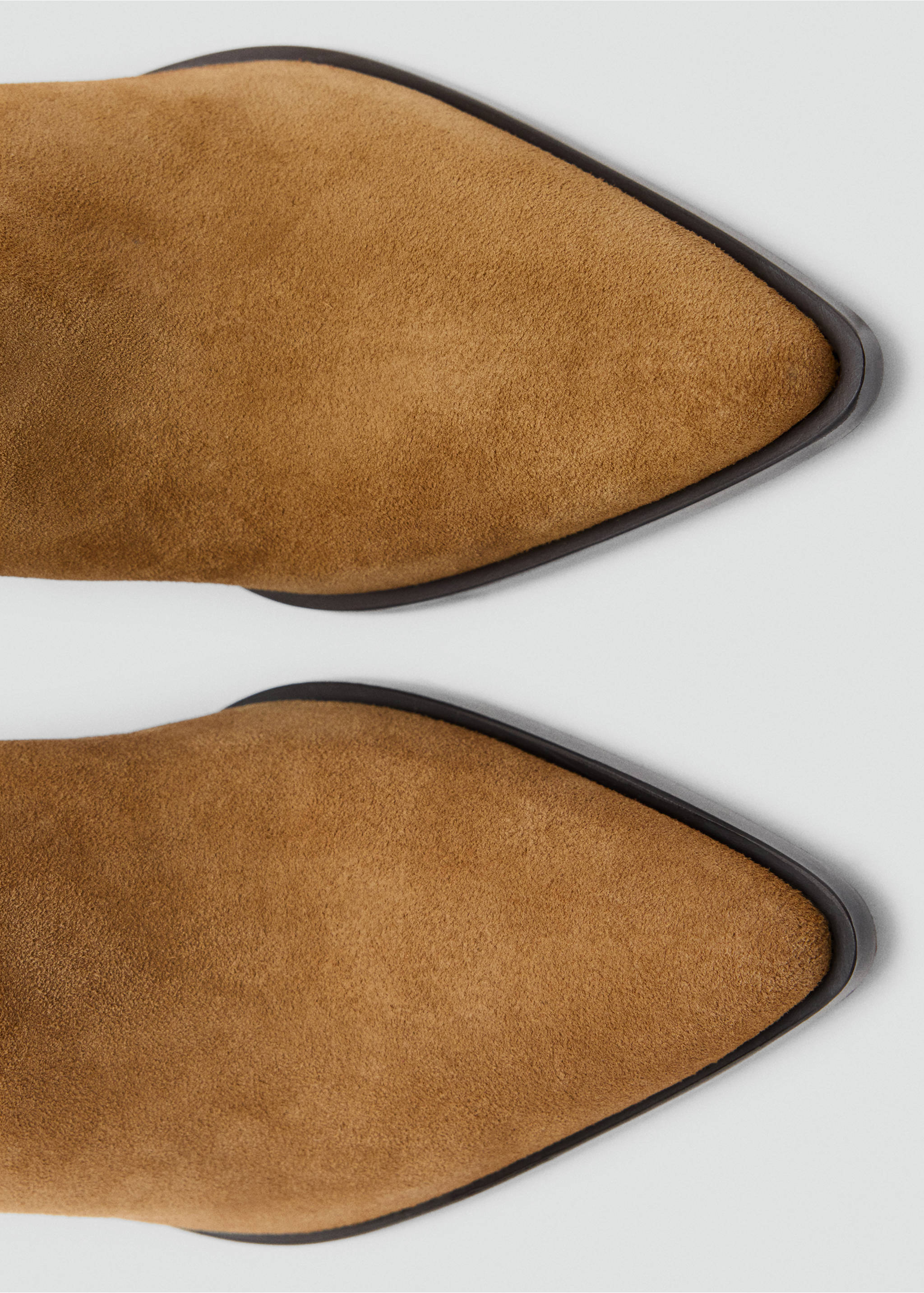 Close-up of brown suede ankle boots with pointed toes., Tobacco Brown. Ref: 47001350-00.