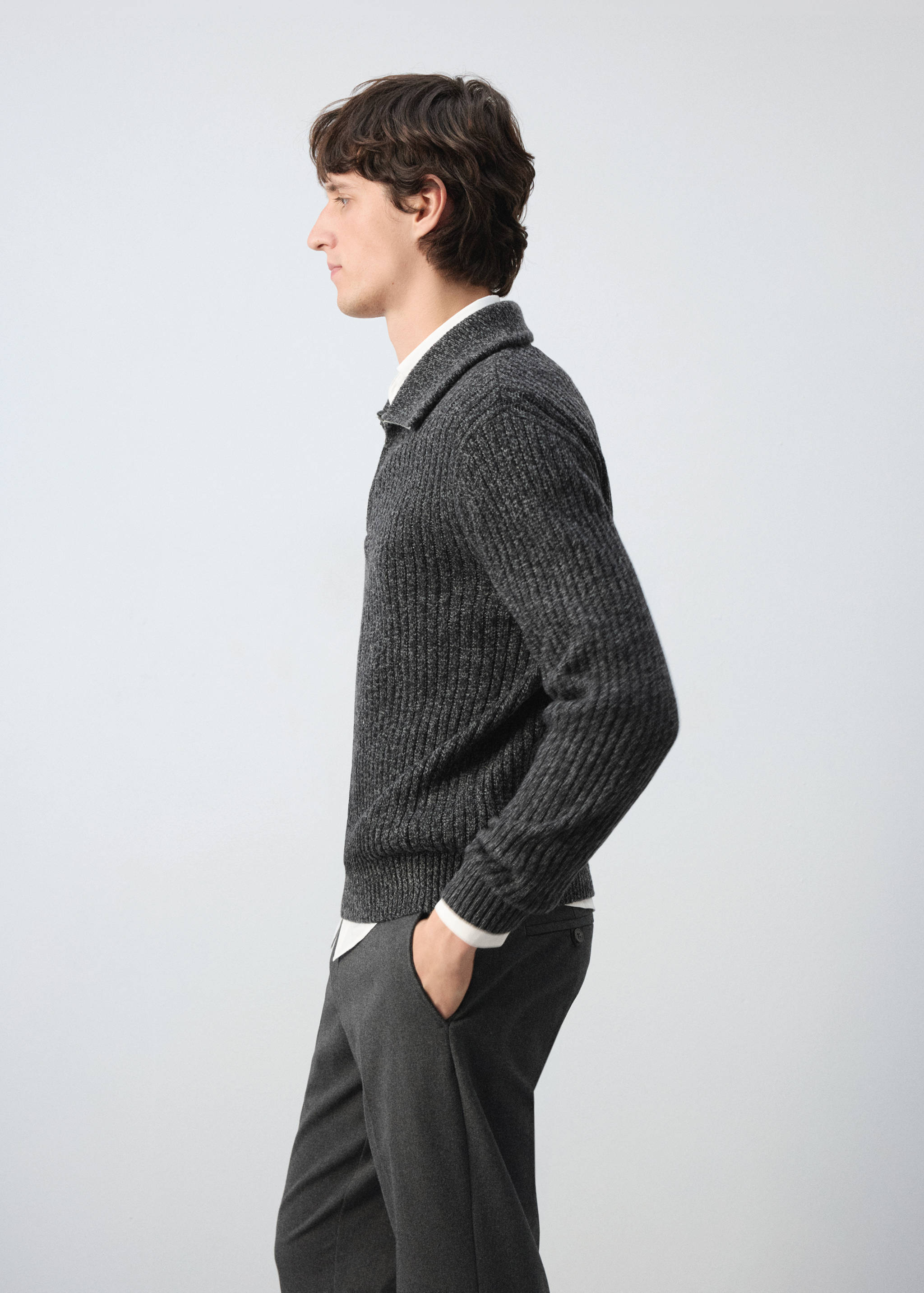 Dark grey ribbed knit jersey with a folded collar and half-zip.