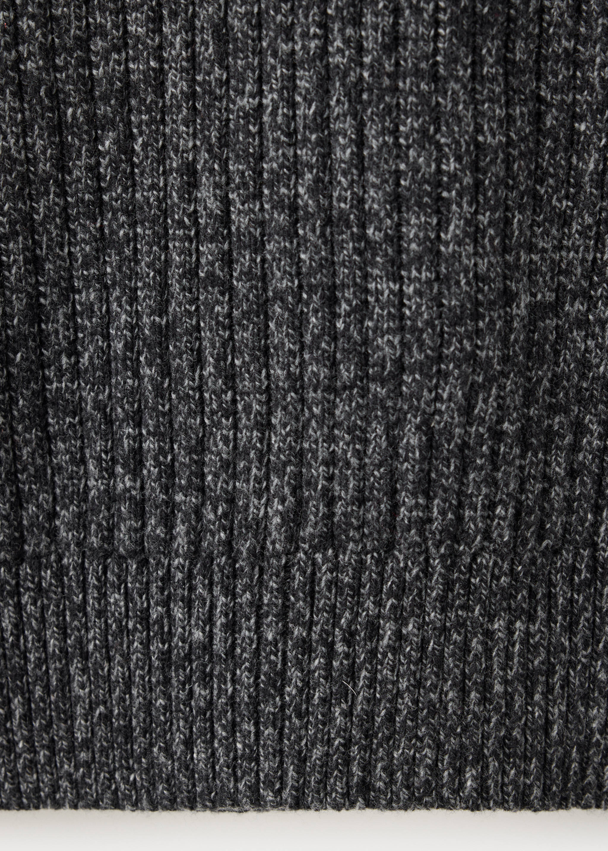Close-up of a dark grey ribbed knit jersey fabric texture.