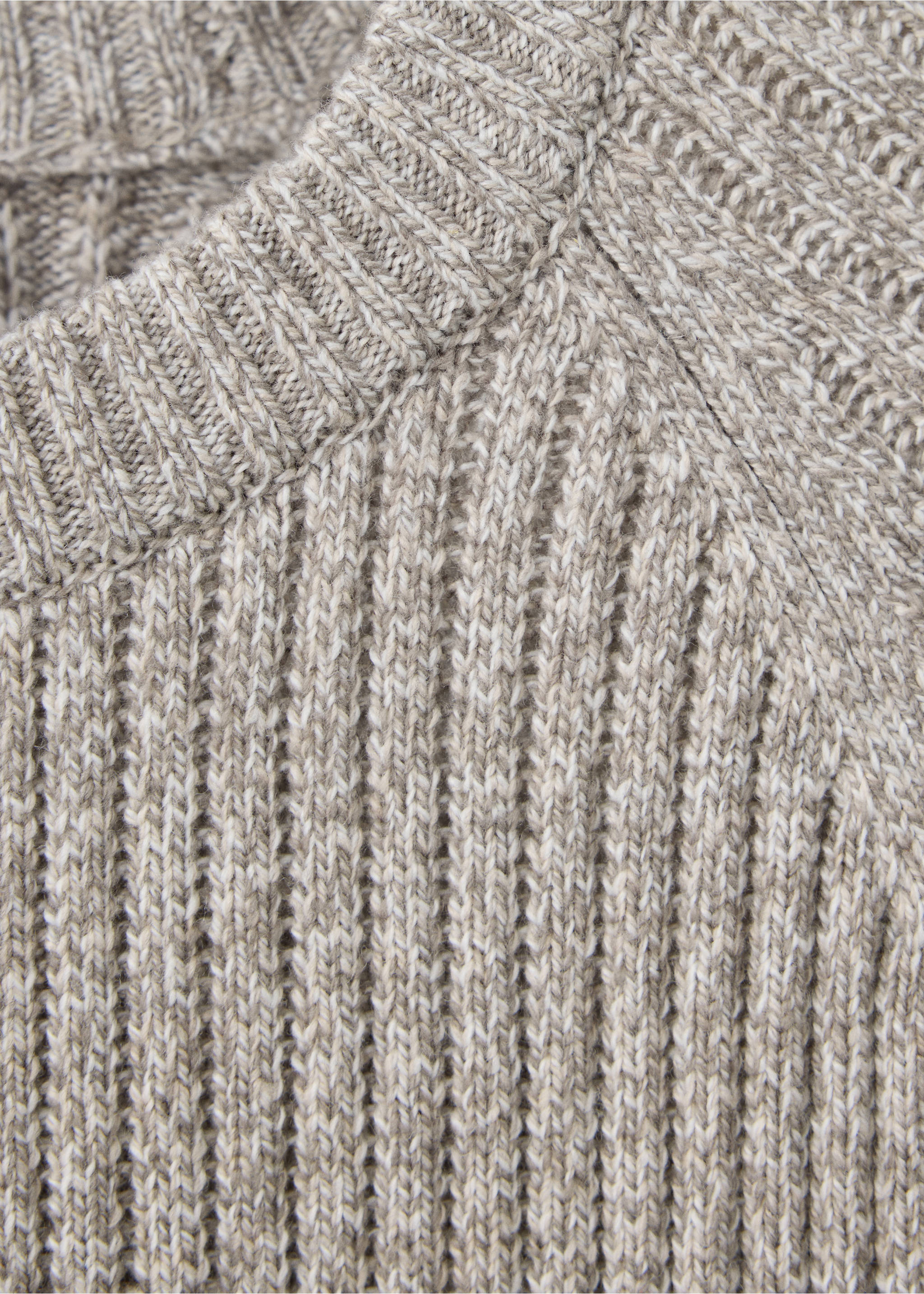Close-up of a beige knitted jumper showing the ribbed crew neckline and texture., Beige. Ref: 47001393-00.