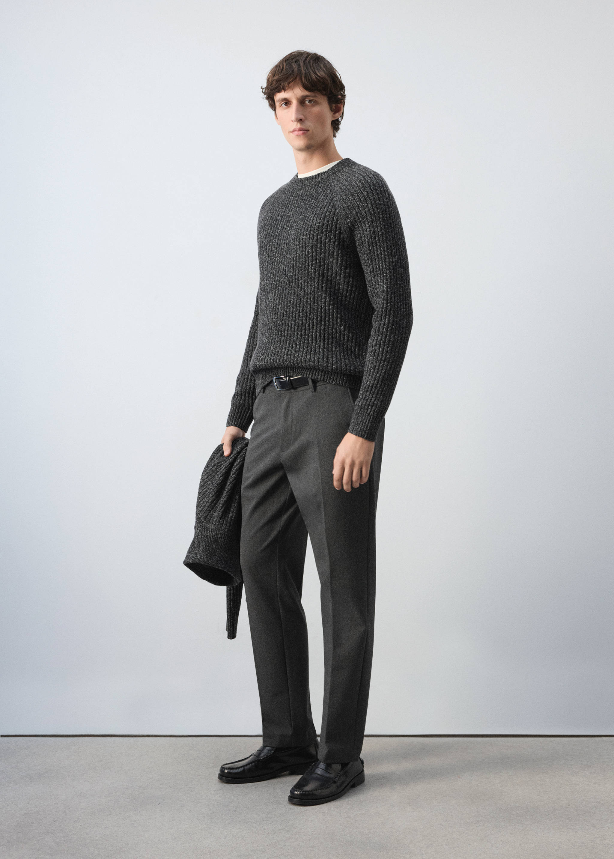 Dark grey ribbed knit crew neck jumper with long raglan sleeves.