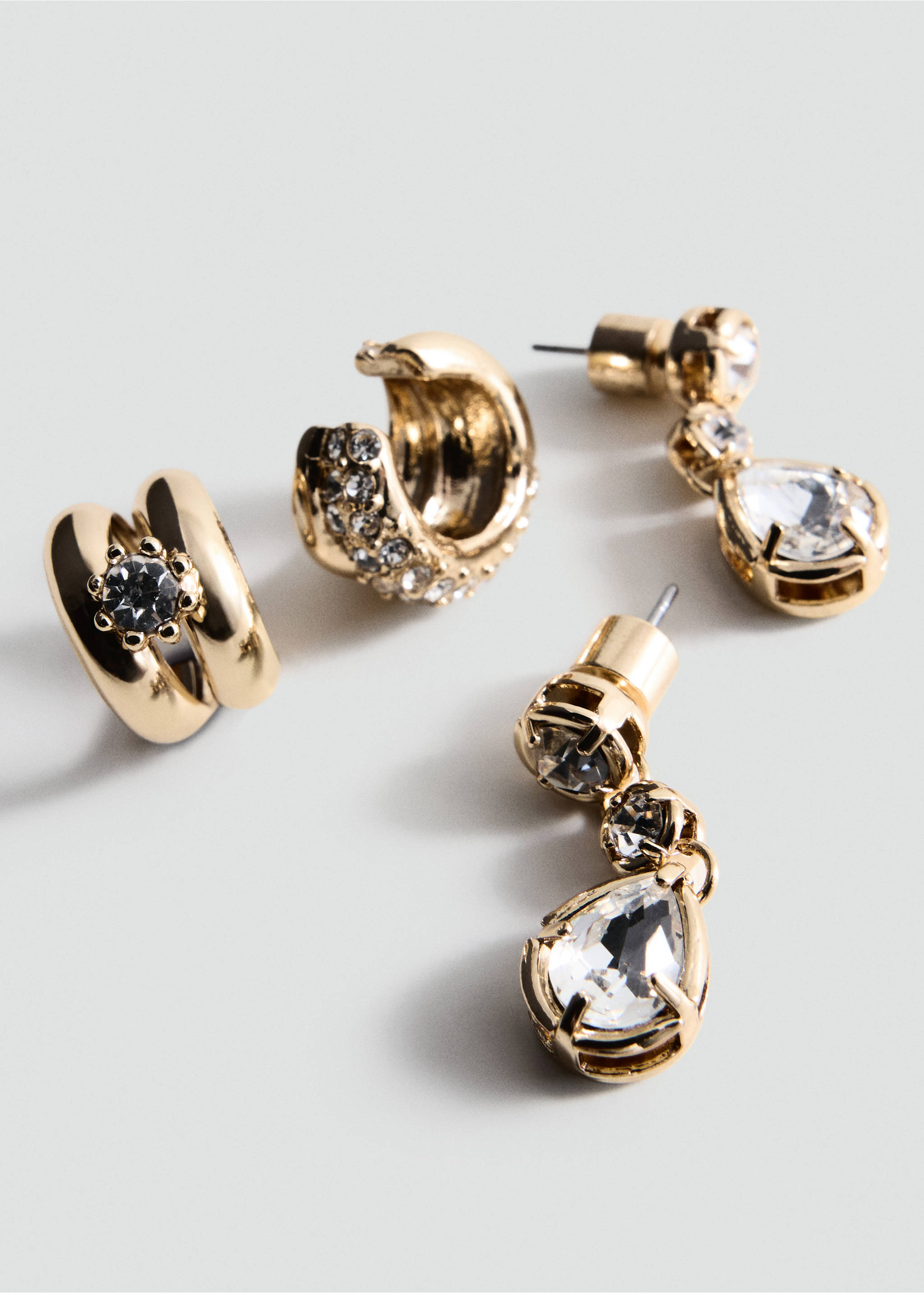 Set of four gold-finish hoop and teardrop crystal earrings., Gold. Ref: 47001395-00.