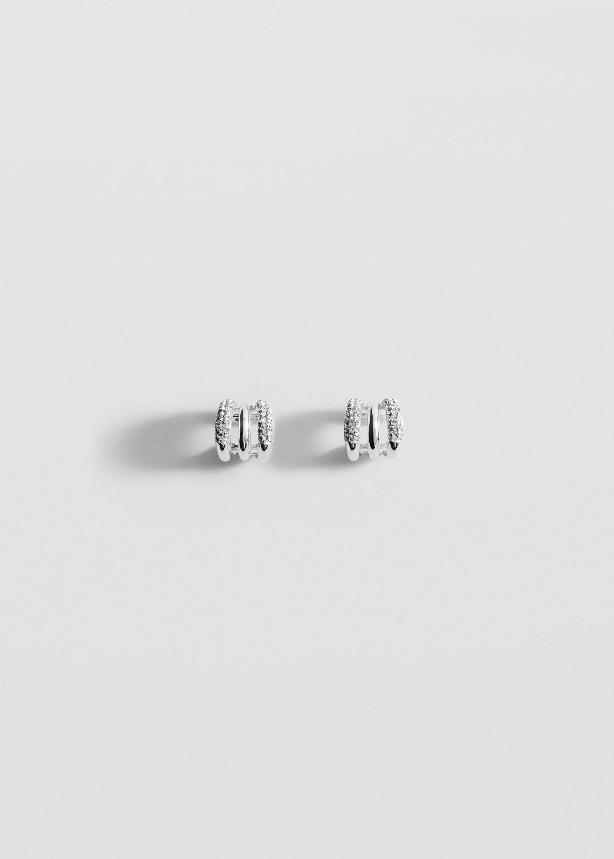 Silver-toned triple-band hoop earrings with pavé-set crystals.