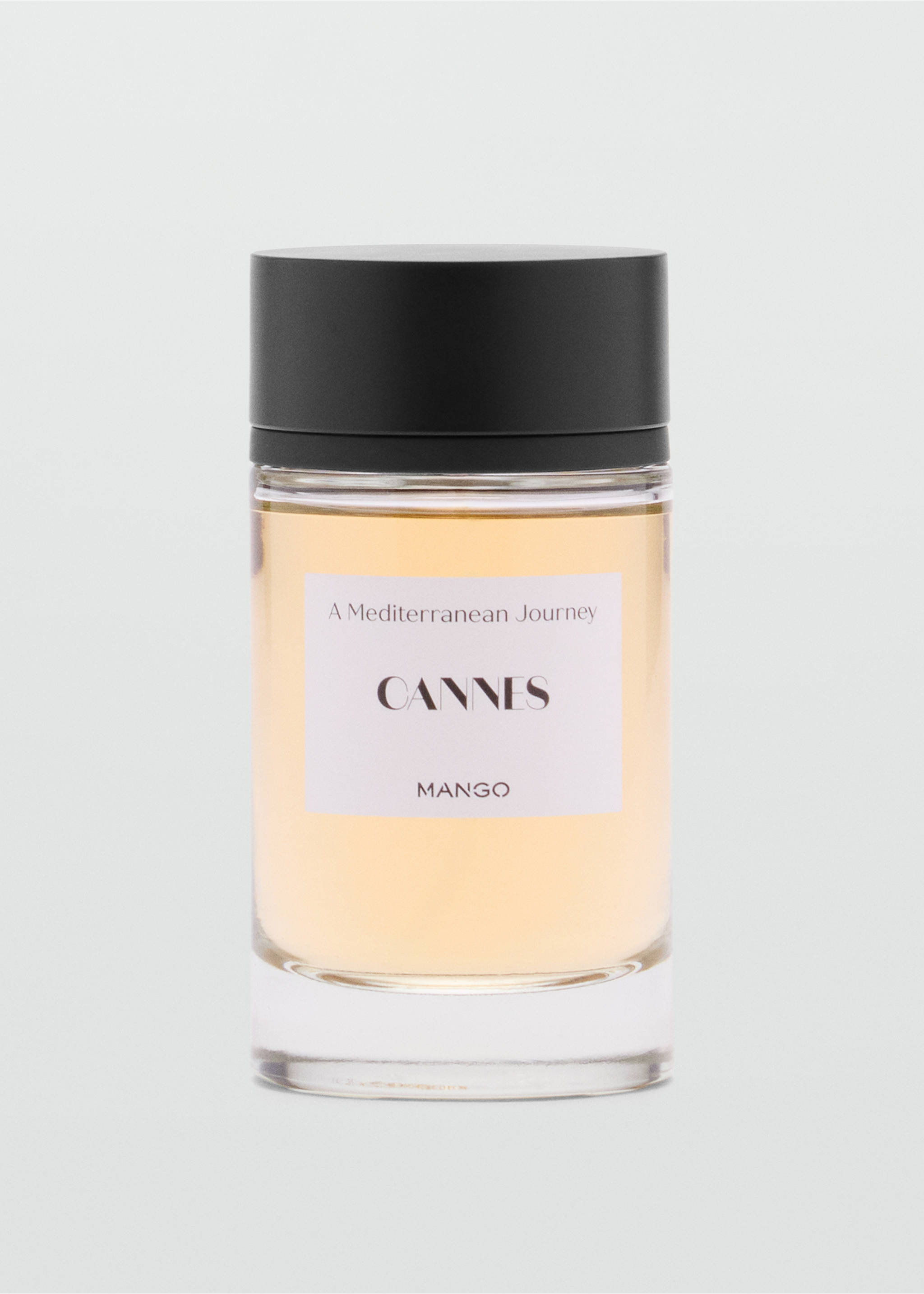 Cannes perfume bottle with amber liquid and black cap., Mink Grey. Ref: 47001439-00.