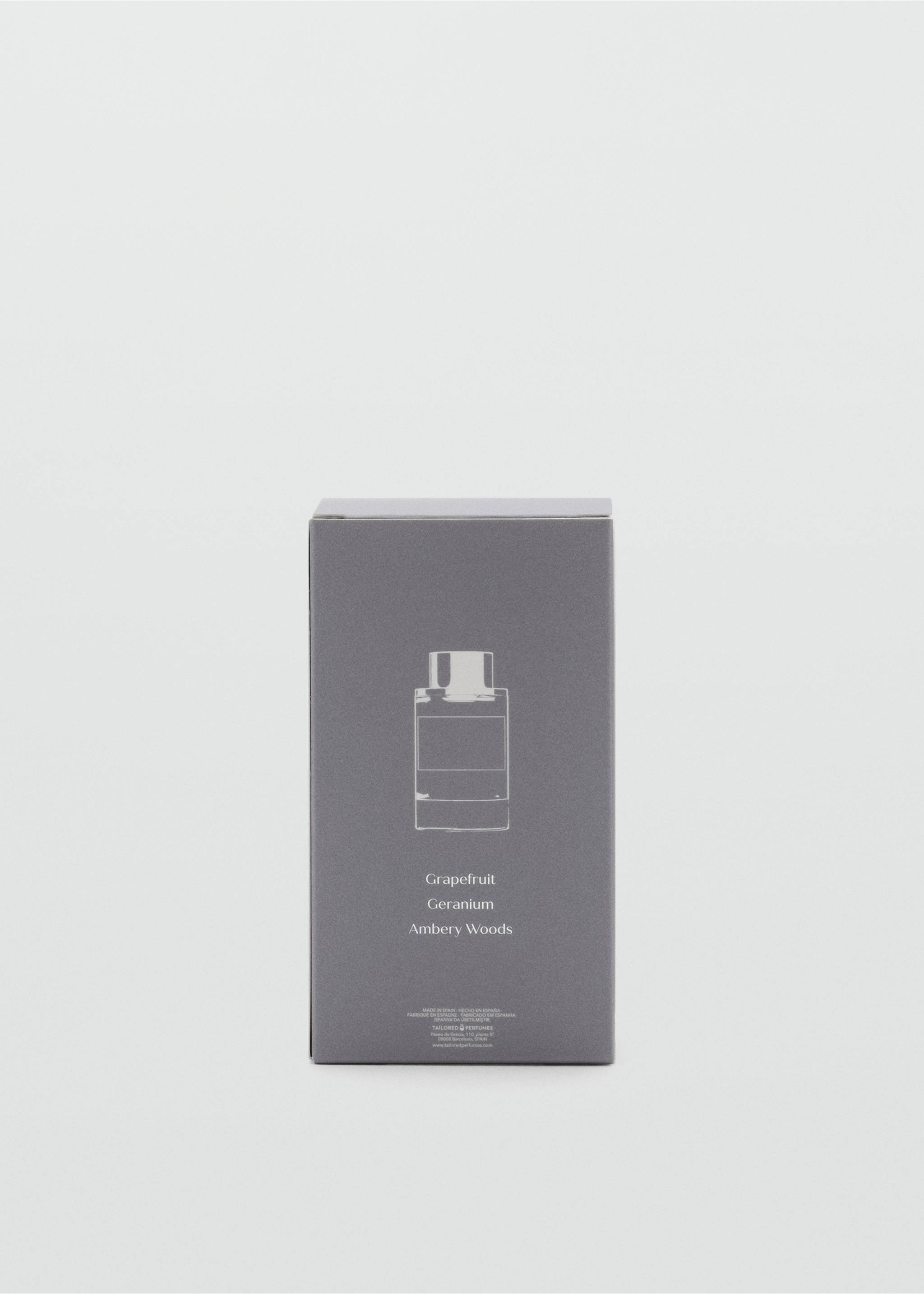 Grey perfume box featuring a white bottle graphic and Grapefruit, Geranium, and Ambery Woods text., Mink Grey. Ref: 47001443-00.