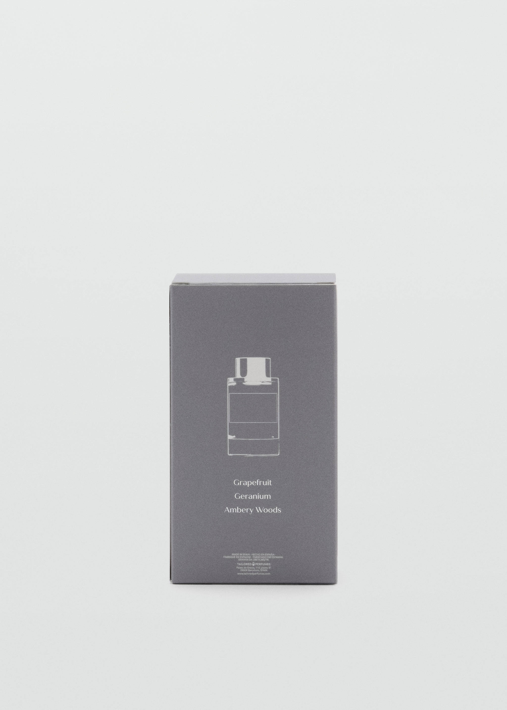Grey perfume box featuring a white bottle graphic and Grapefruit, Geranium, and Ambery Woods text.